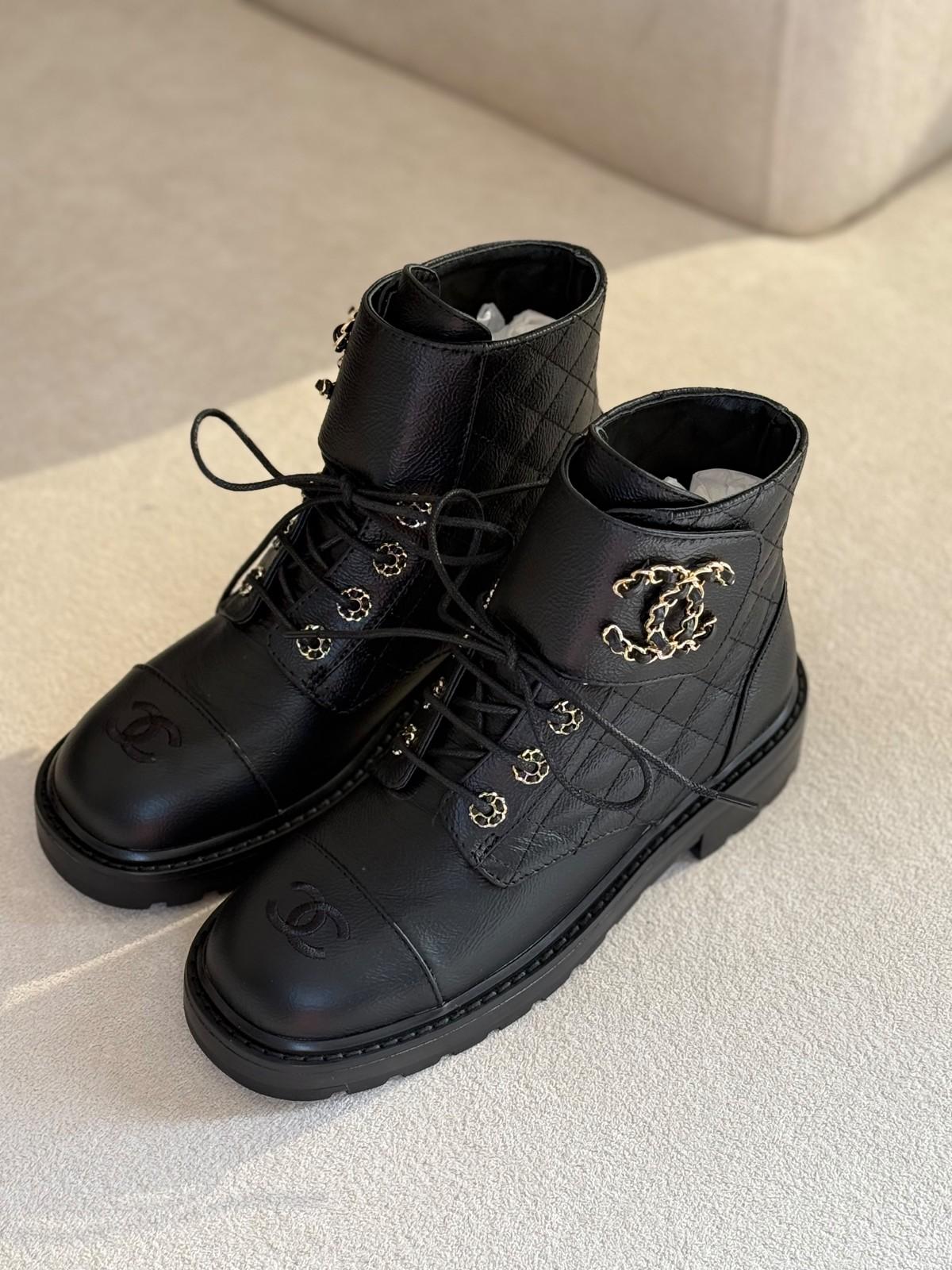 Chanel Quilted Calfskin Lace-Up Ankle Boots in Black with Gold CC Hardware · 2