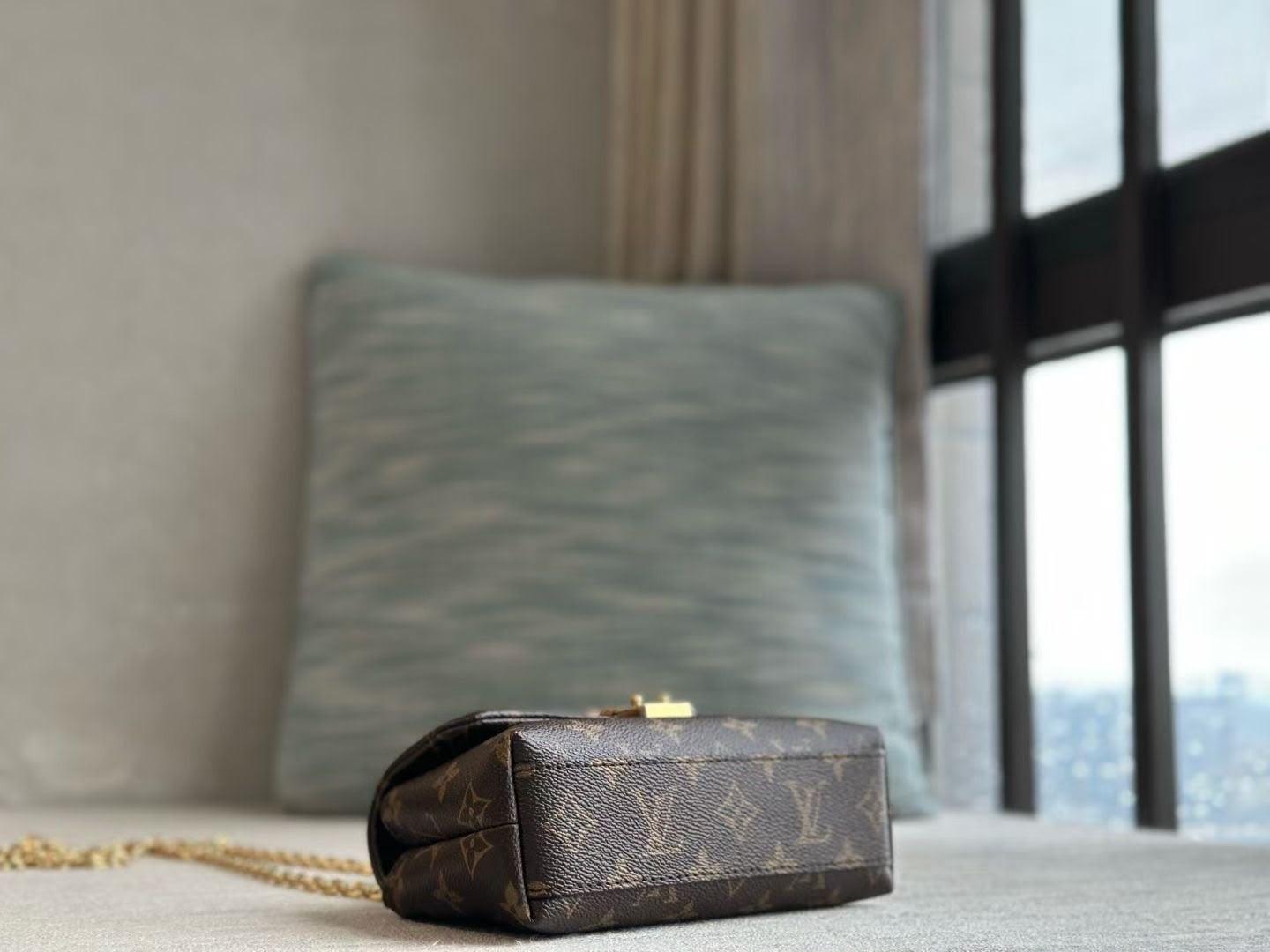 Louis Vuitton Nano Madeleine Handbag in Monogram Canvas · 2