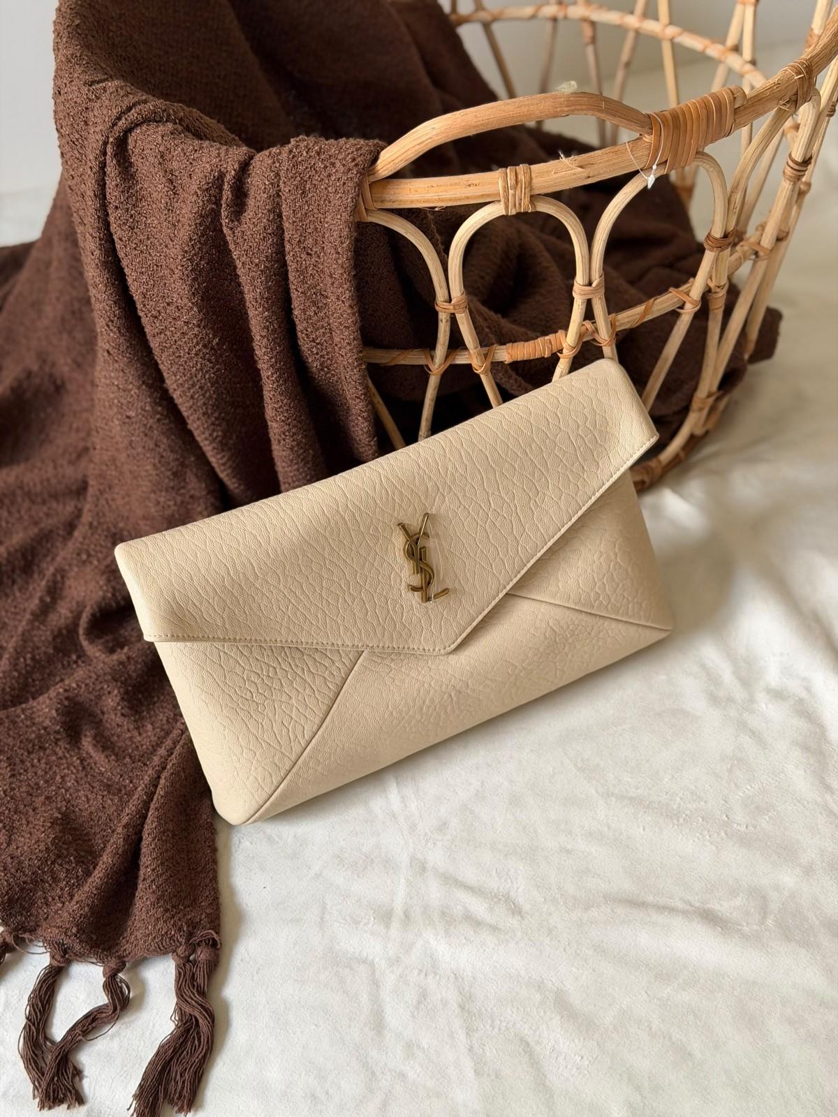 Saint Laurent Cassandre large envelope clutch in grained leather