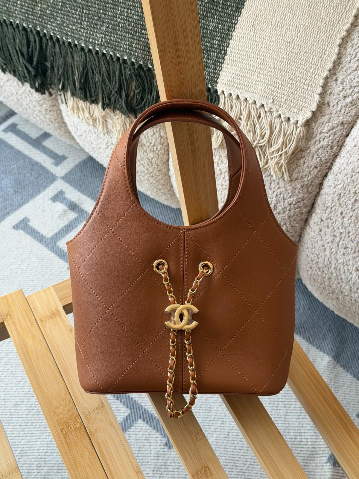 Chanel leather hobo bag with CC drawstring · 3