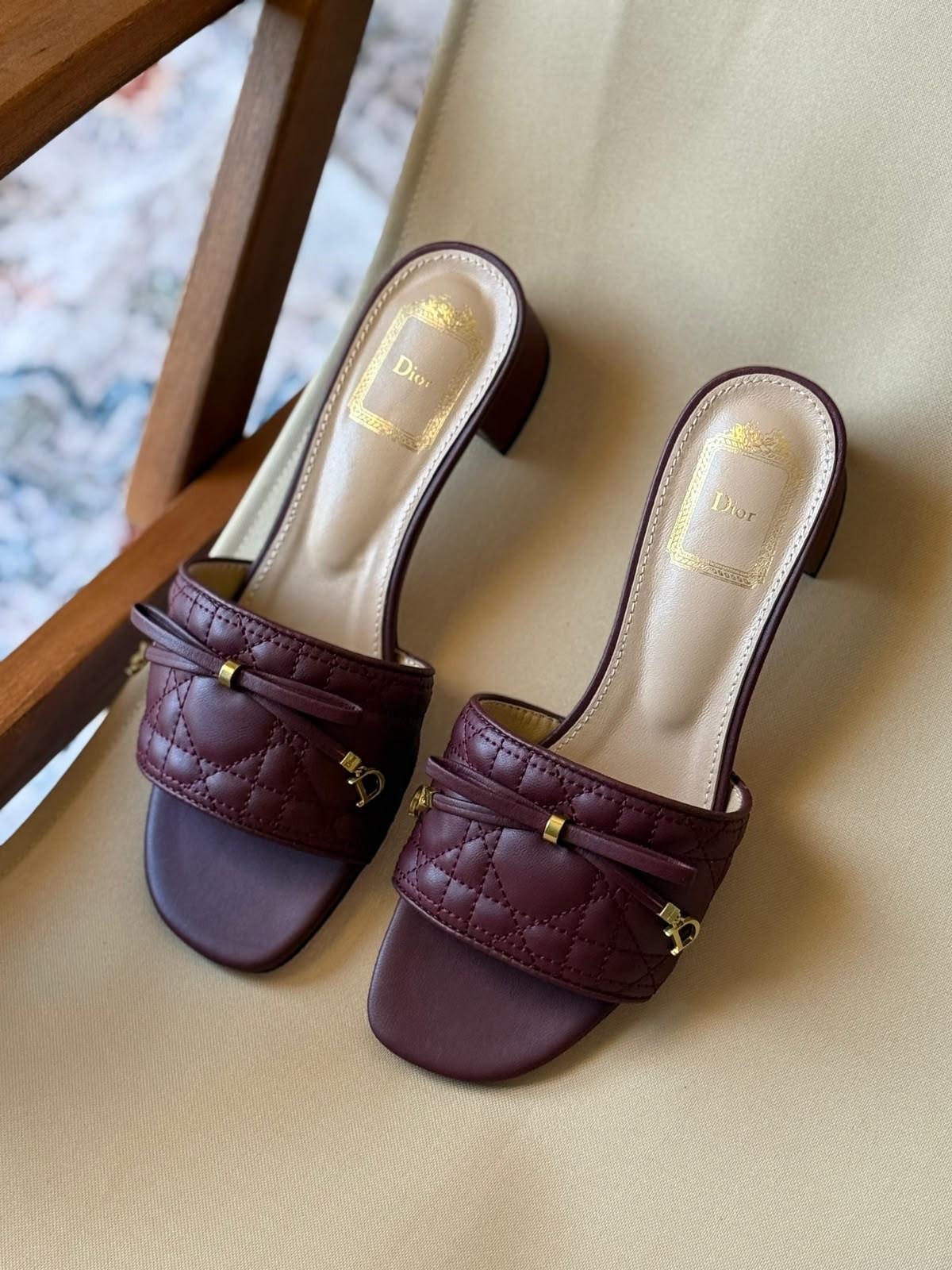 Dior quilted leather mules with Dior bow charm