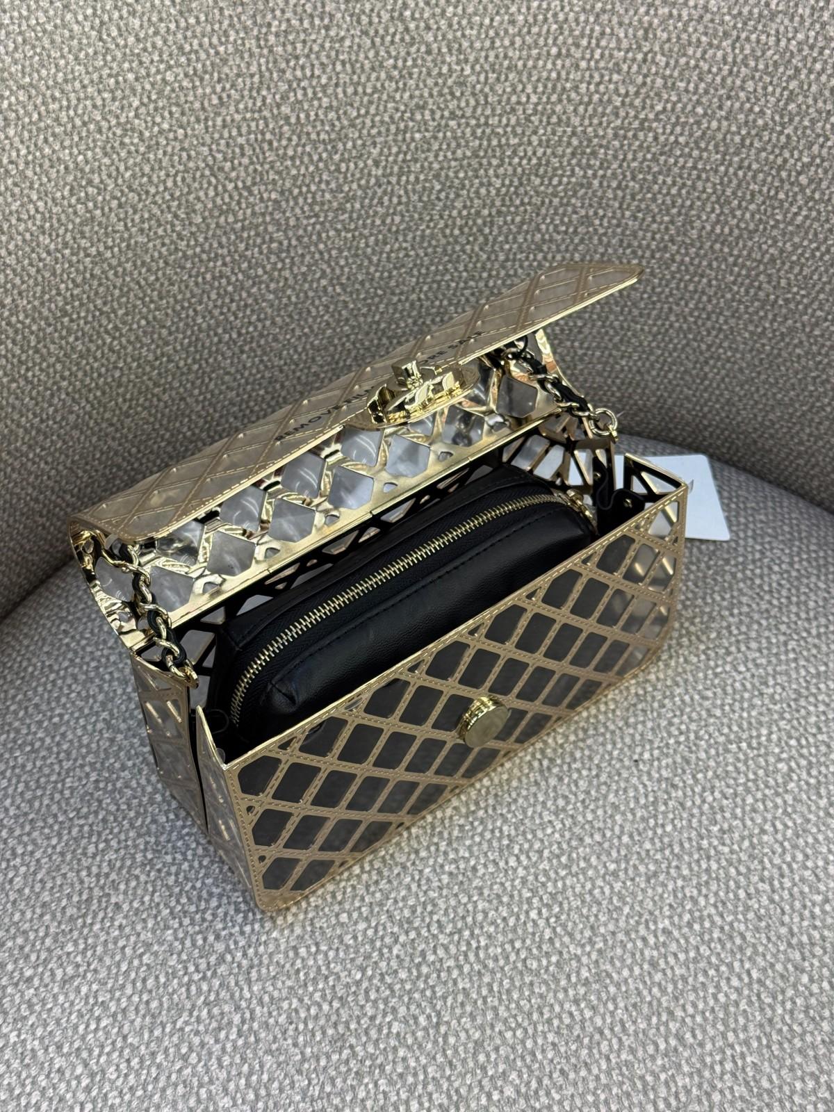 Gold metal lattice clutch with black leather pouch and chain · 2