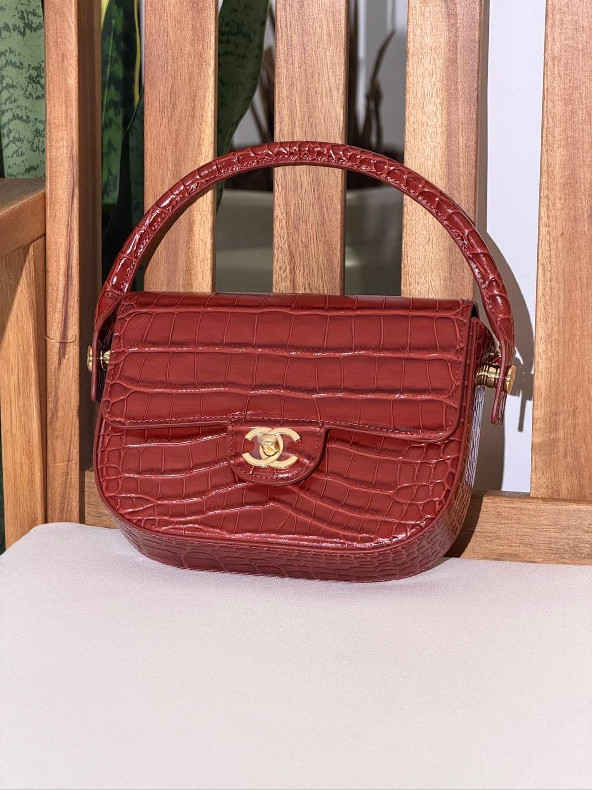 Chanel Mini Flap Bag with Top Handle in crocodile-embossed calfskin · 2