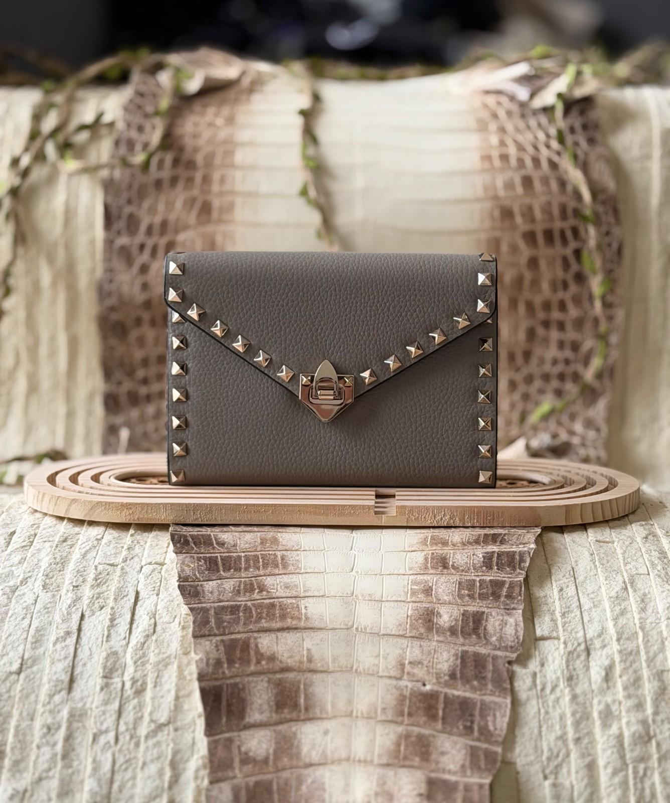 Valentino Garavani Rockstud flap wallet in grained leather · 2