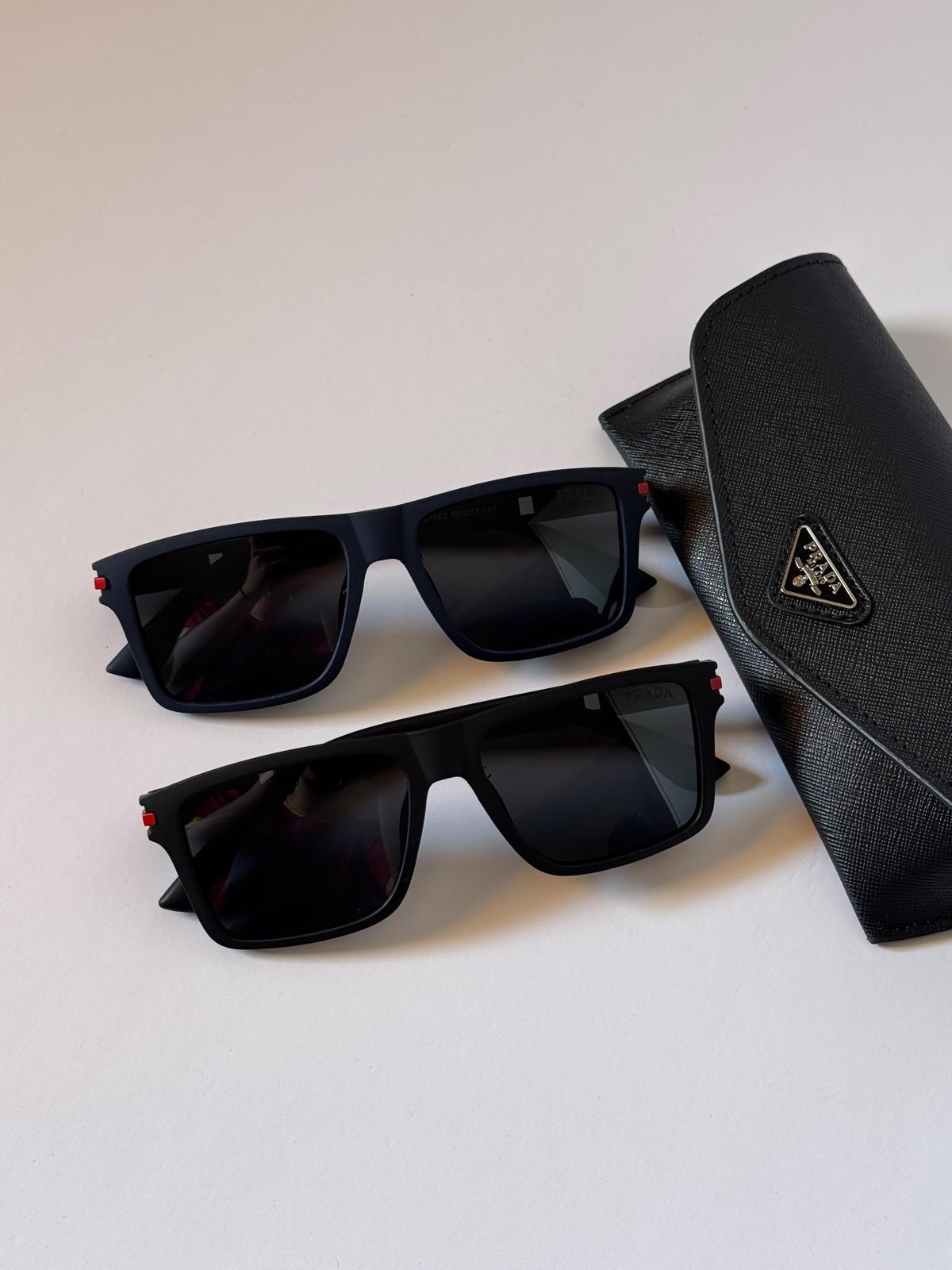 Prada Linea Rossa black rectangular sunglasses · 2