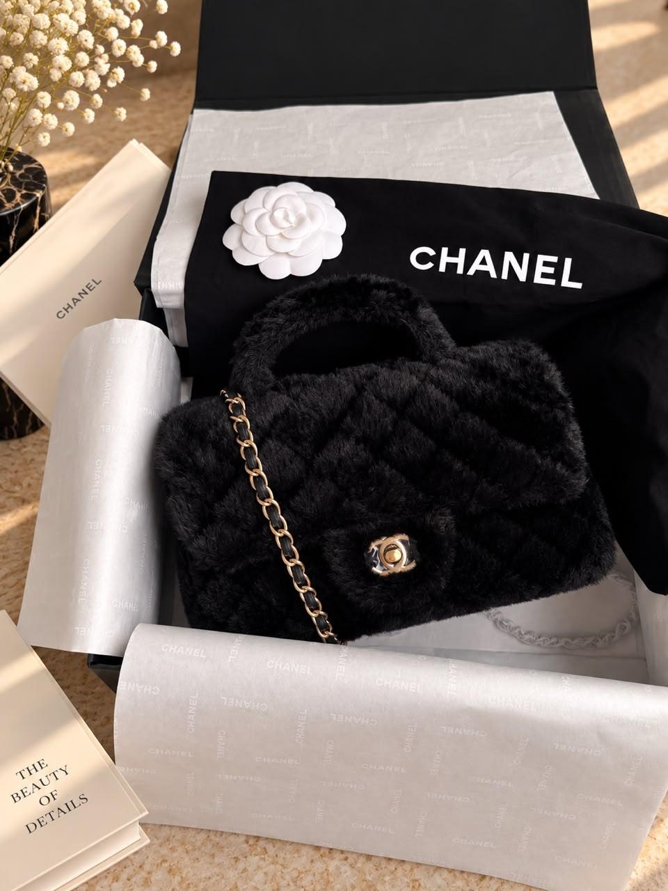 Chanel quilted shearling flap bag with top handle and chain · 2