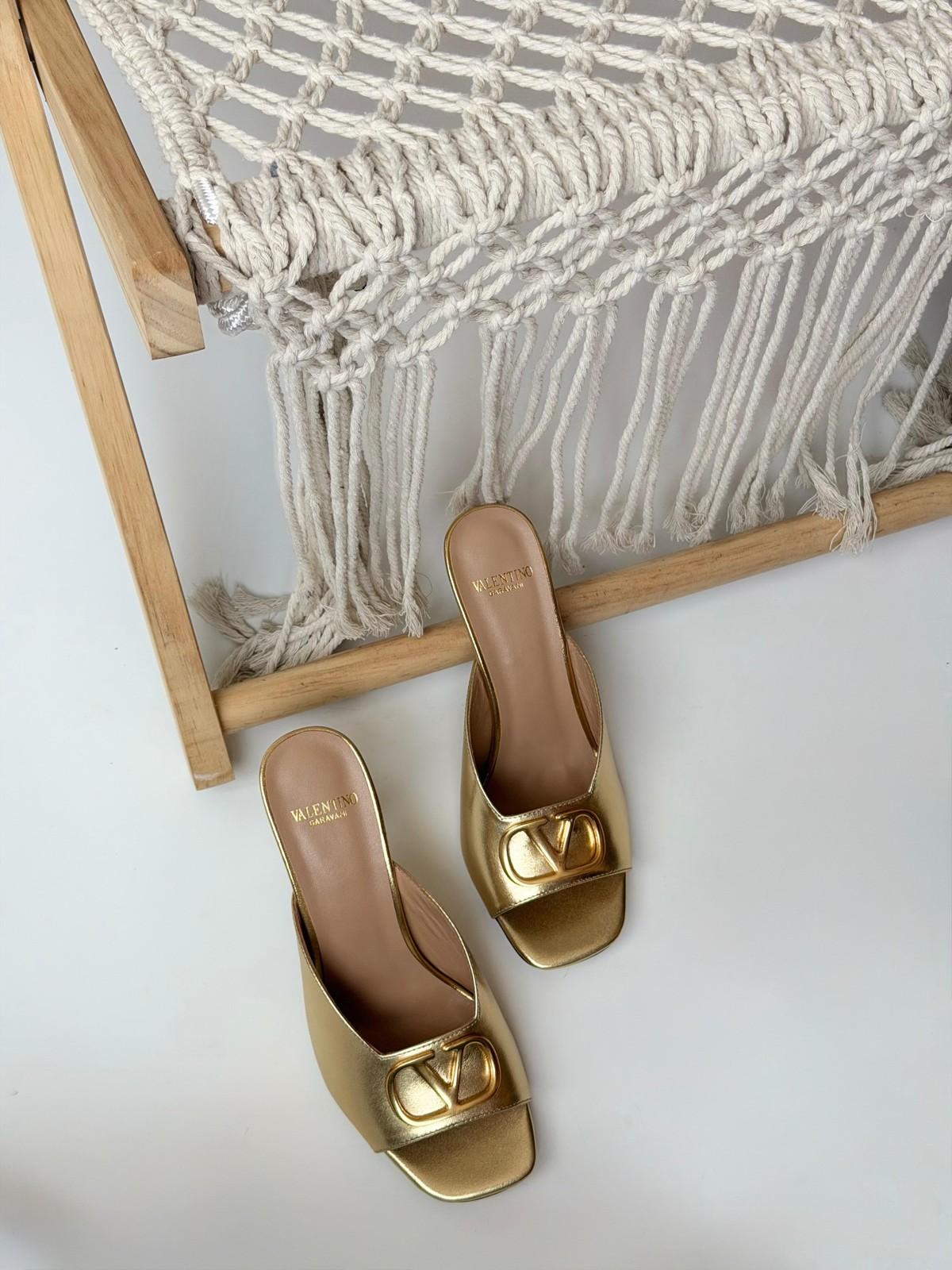 Valentino Garavani VLogo Metallic Slide Sandal in Gold · 2