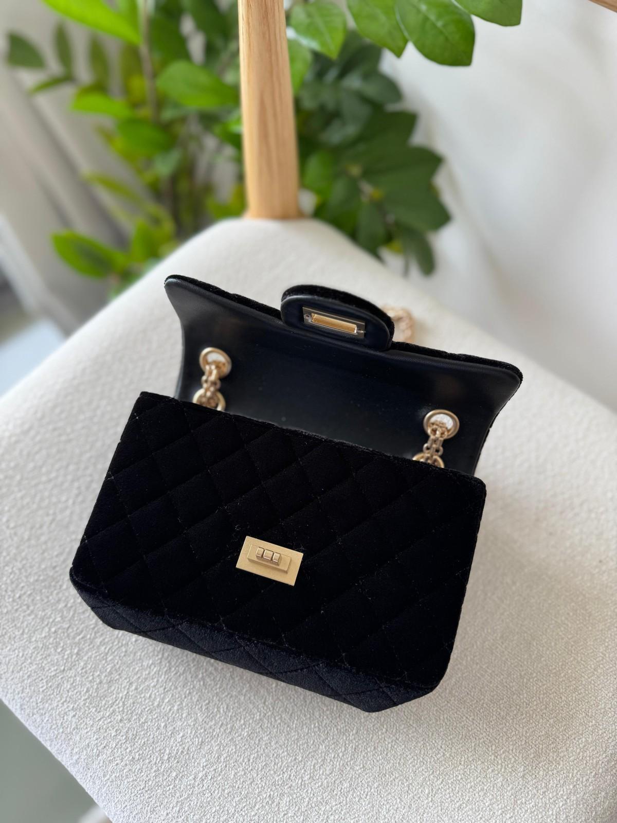 Chanel black quilted velvet flap bag · 2