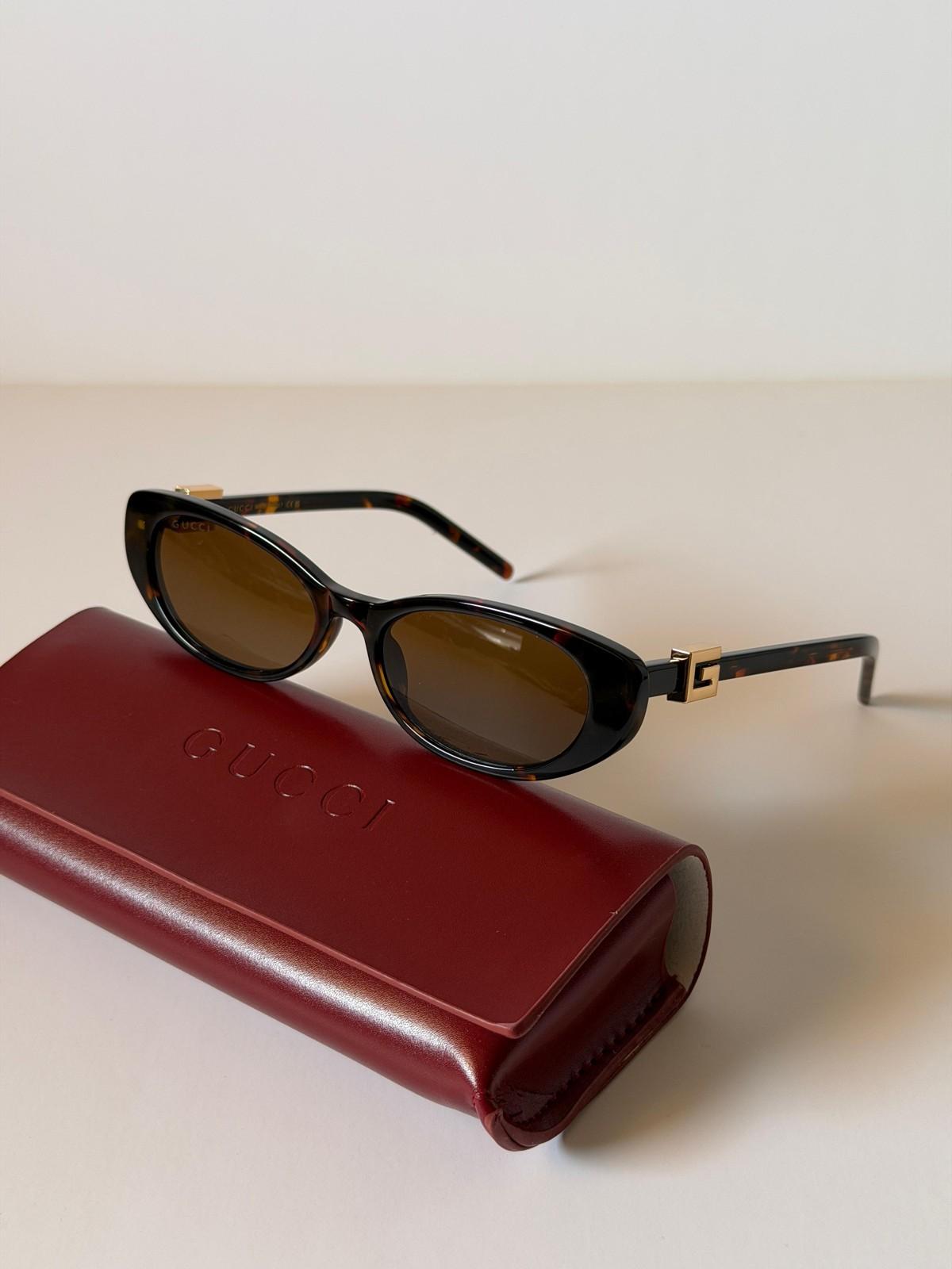 Gucci oval acetate sunglasses with G logo temples · 3
