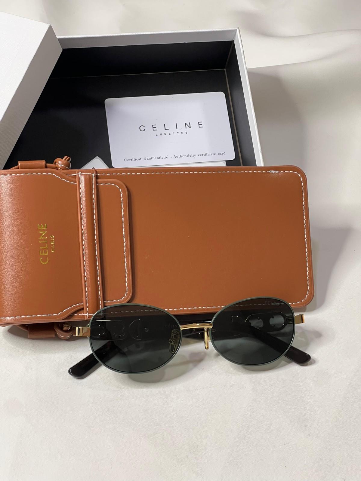 Celine gold oval metal sunglasses with Triomphe knot · 2