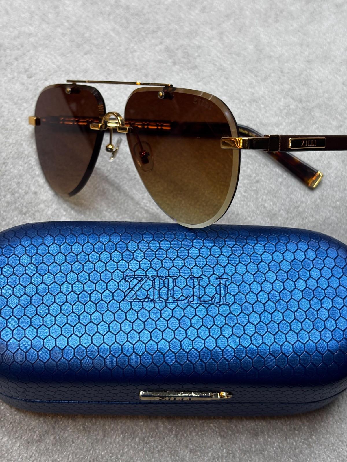 Zilli gold aviator sunglasses with tortoise temples · 2