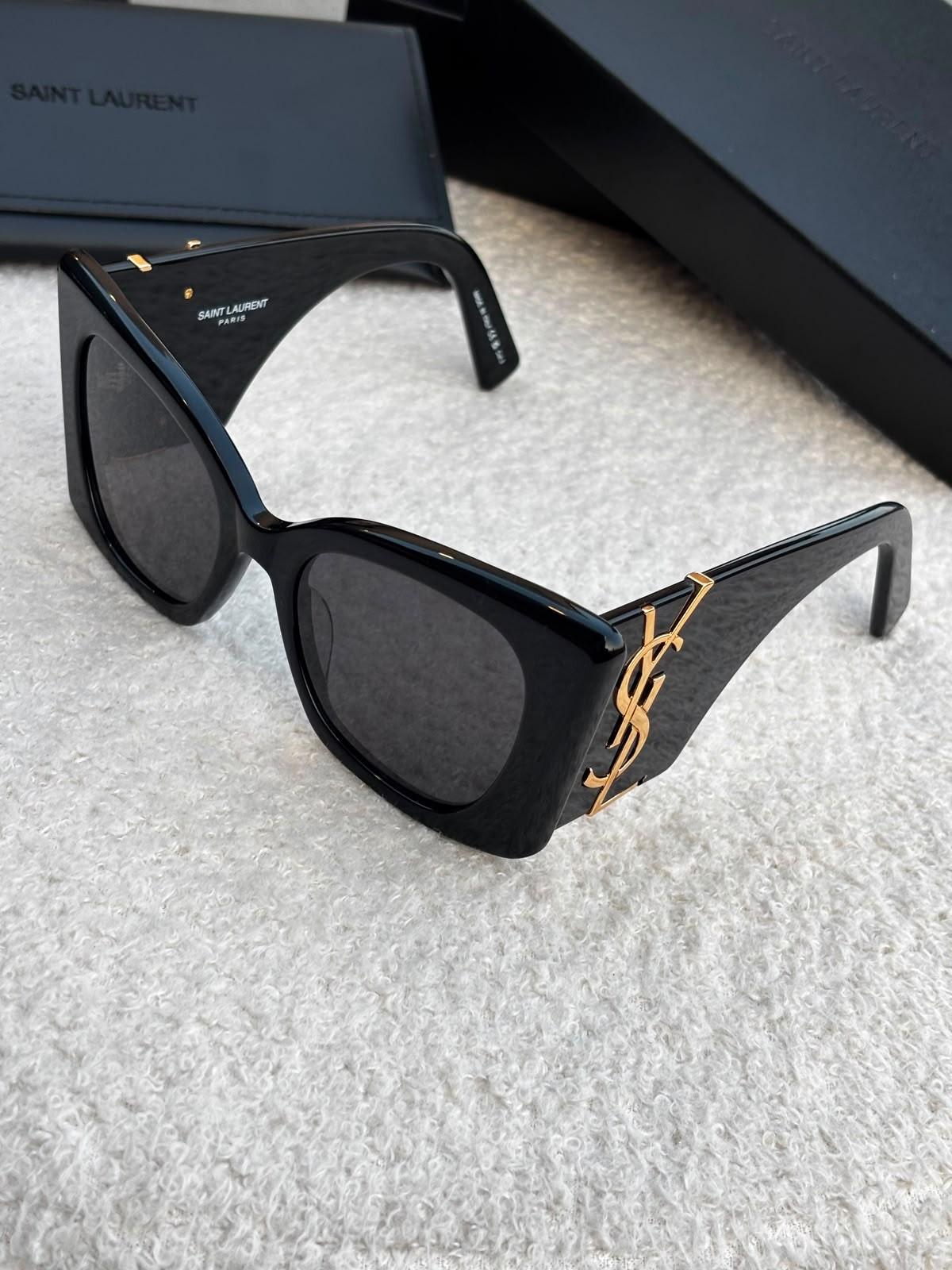 Saint Laurent black acetate cat-eye sunglasses with Cassandre logo · 2