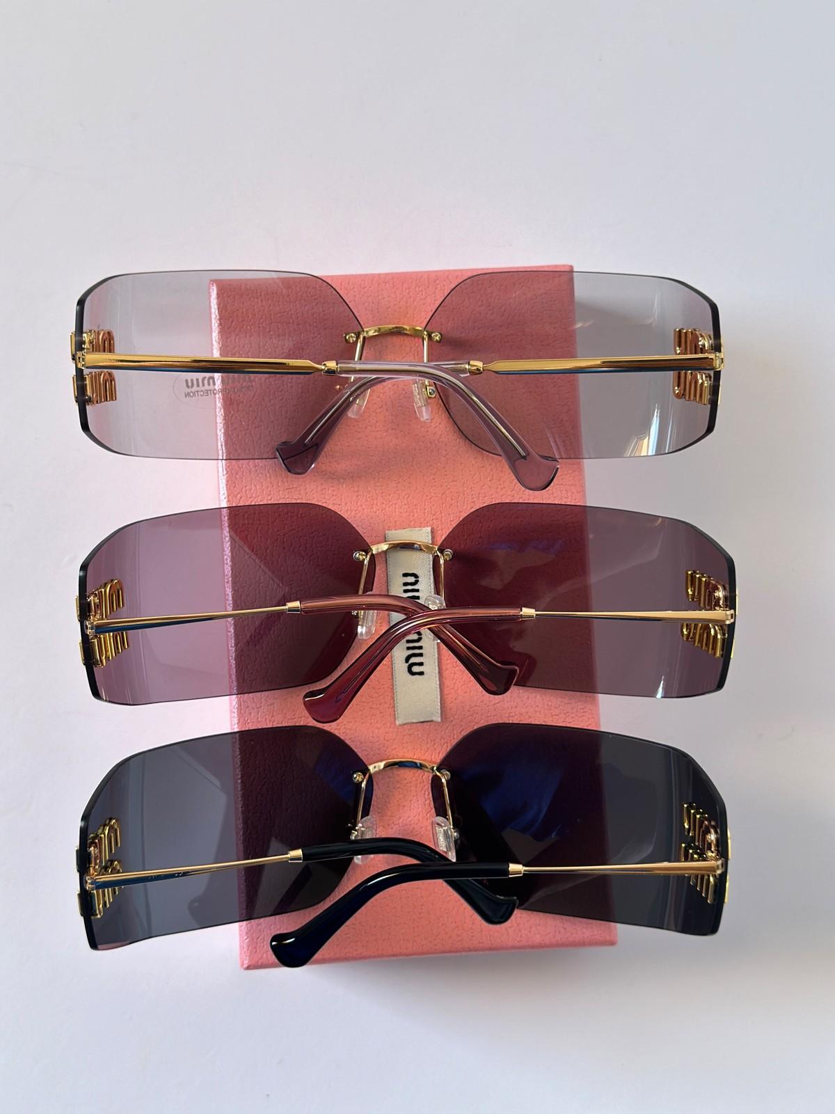 Miu Miu rimless sunglasses with miu miu logo temples · 2