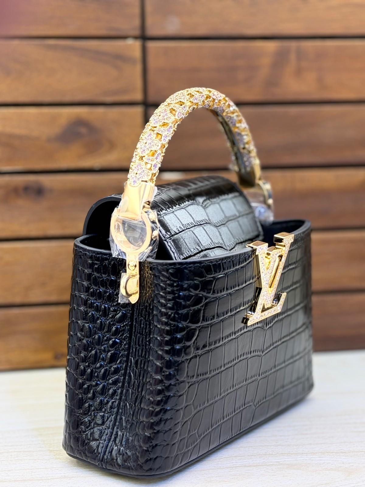Louis Vuitton Capucines Mini in crystal-embellished crocodile-pattern leather · 2