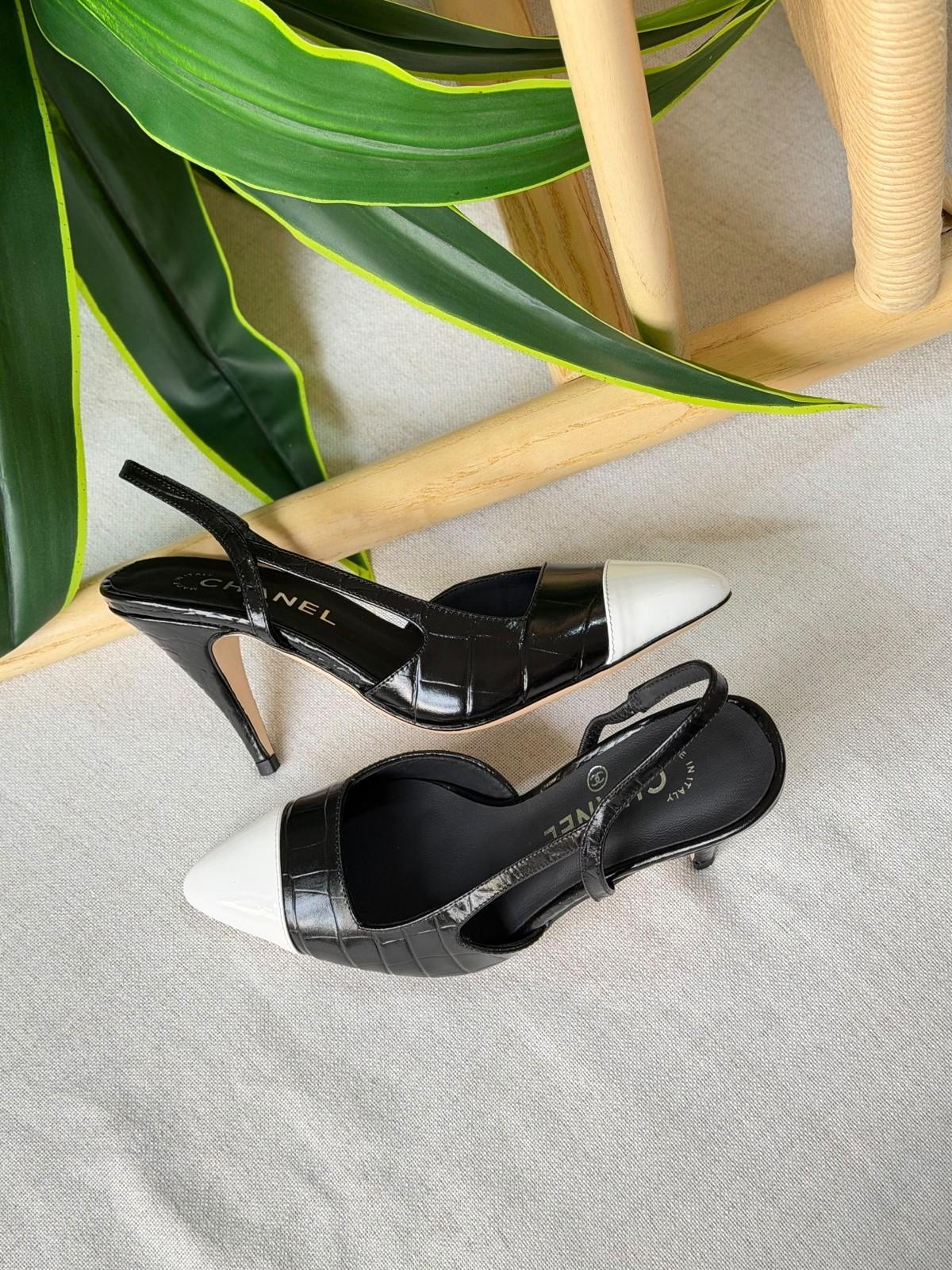 Chanel black slingback pumps with white cap toe · 3
