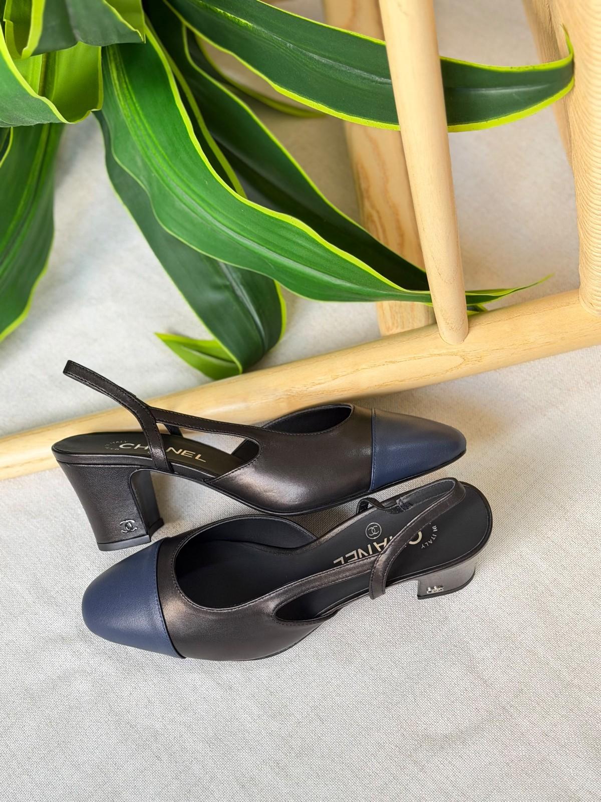 Chanel Slingback Pumps in Black and Navy Leather with Cap Toe · 2