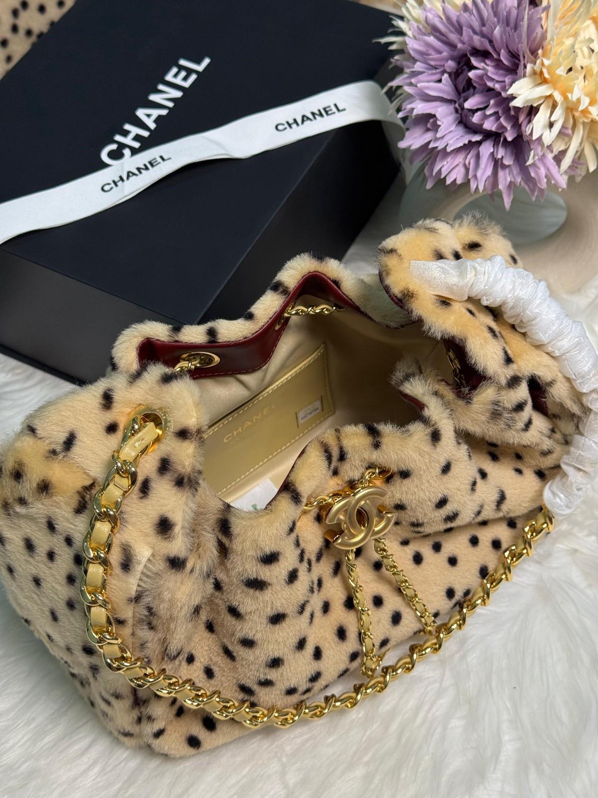 Chanel leopard-print fur bag with gold hardware · 2
