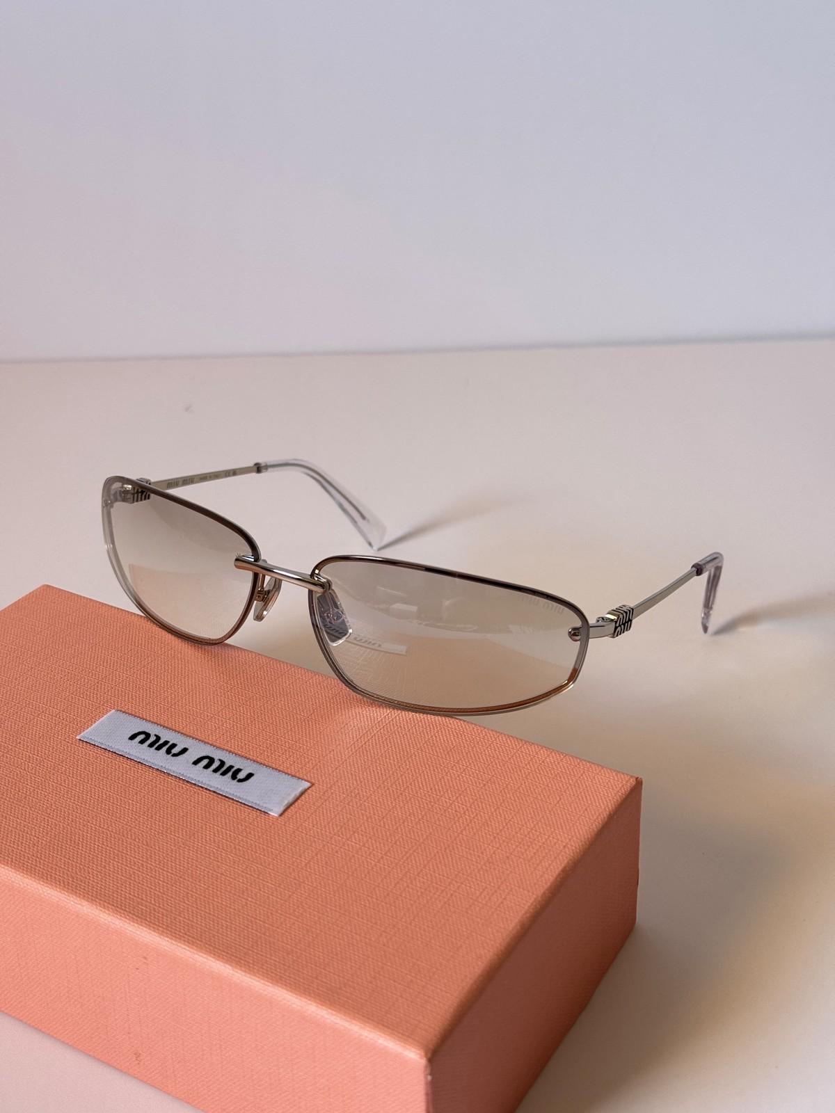 Miu Miu metal eyeglasses with twisted temple detail · 3