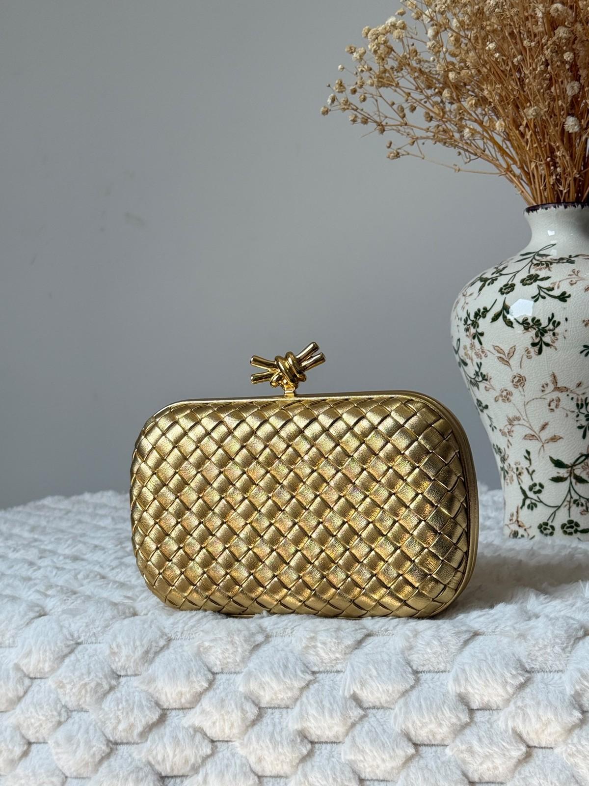 Woven Knot Clutch in Leather · 2