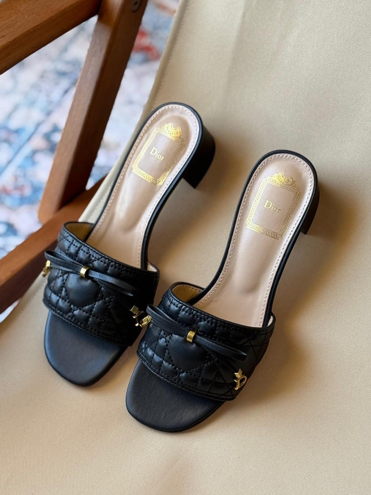 Dior quilted leather mules with Dior bow charm · 2