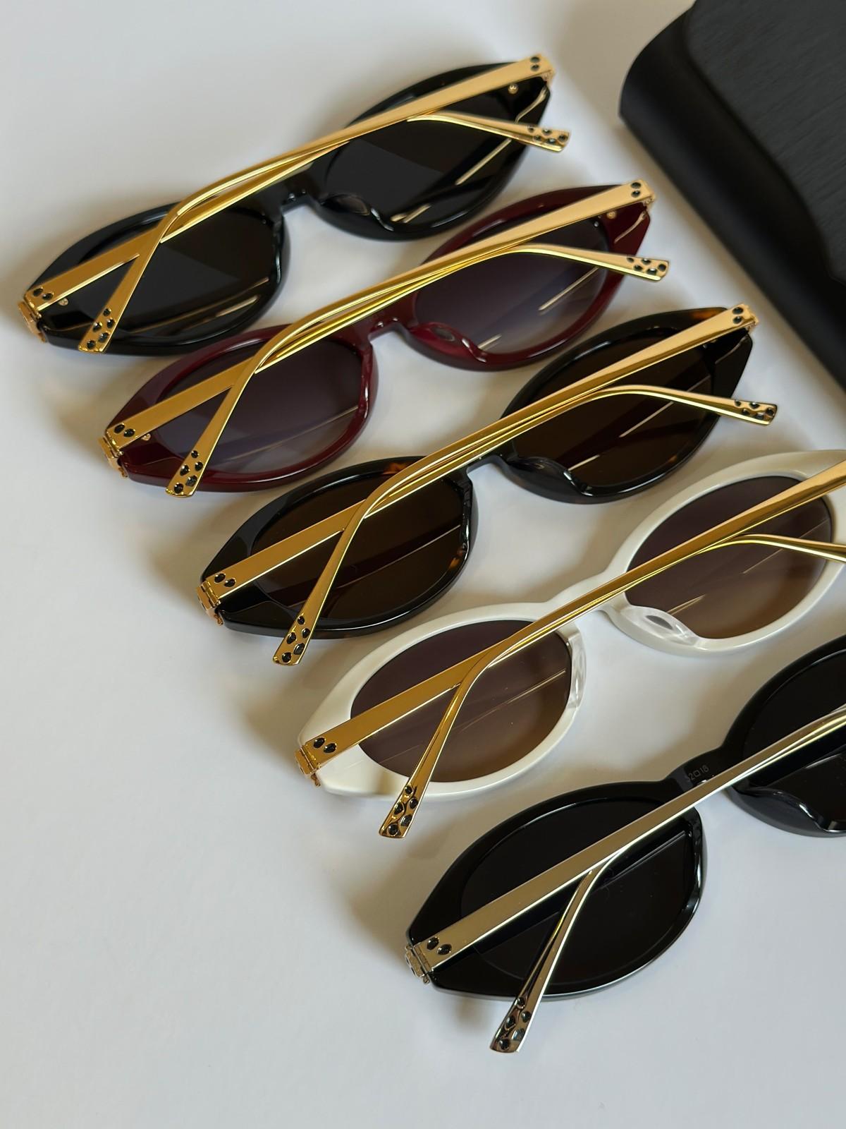Cartier Panthère de Cartier oval sunglasses with panther-head temples · 2