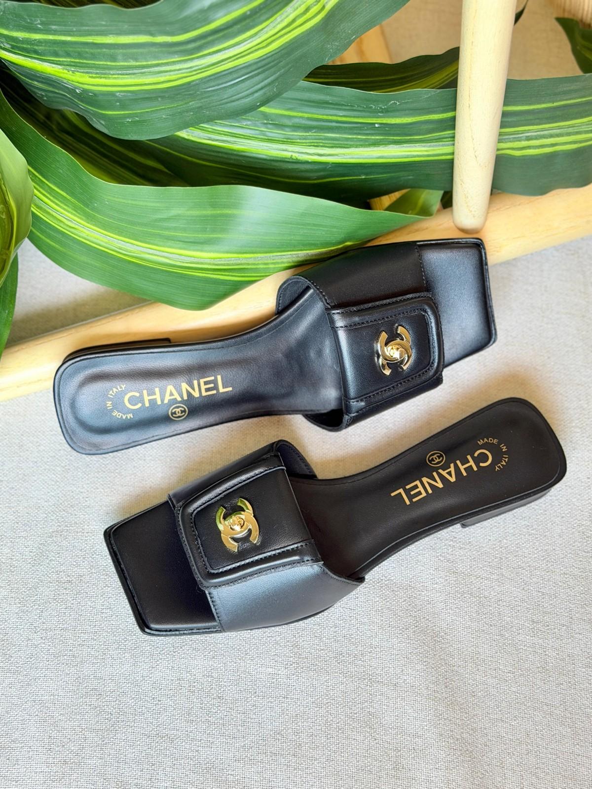 Chanel CC Turn-Lock Flat Slide Sandals in Leather · 3