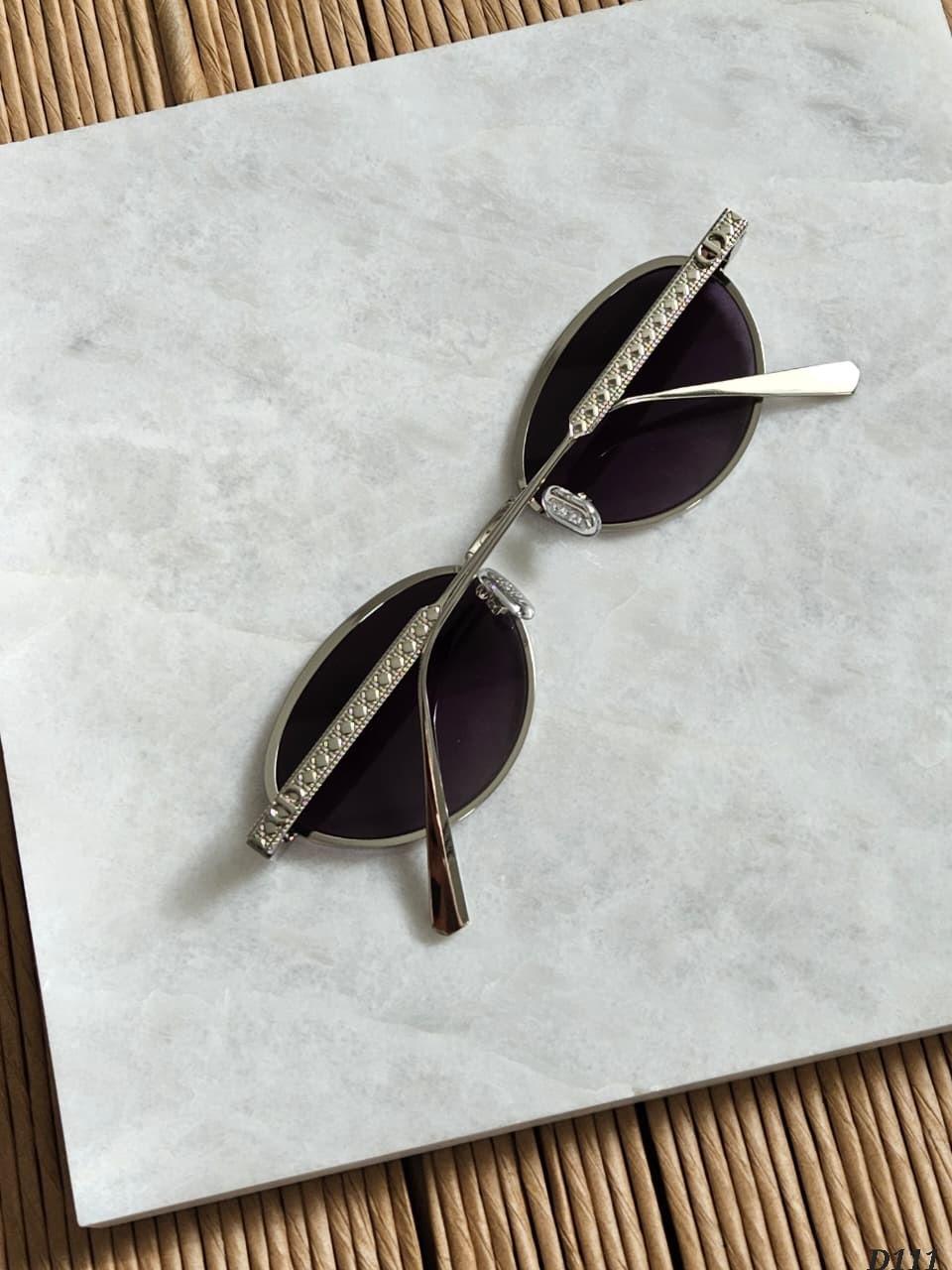 Silver oval metal sunglasses with purple lenses · 3