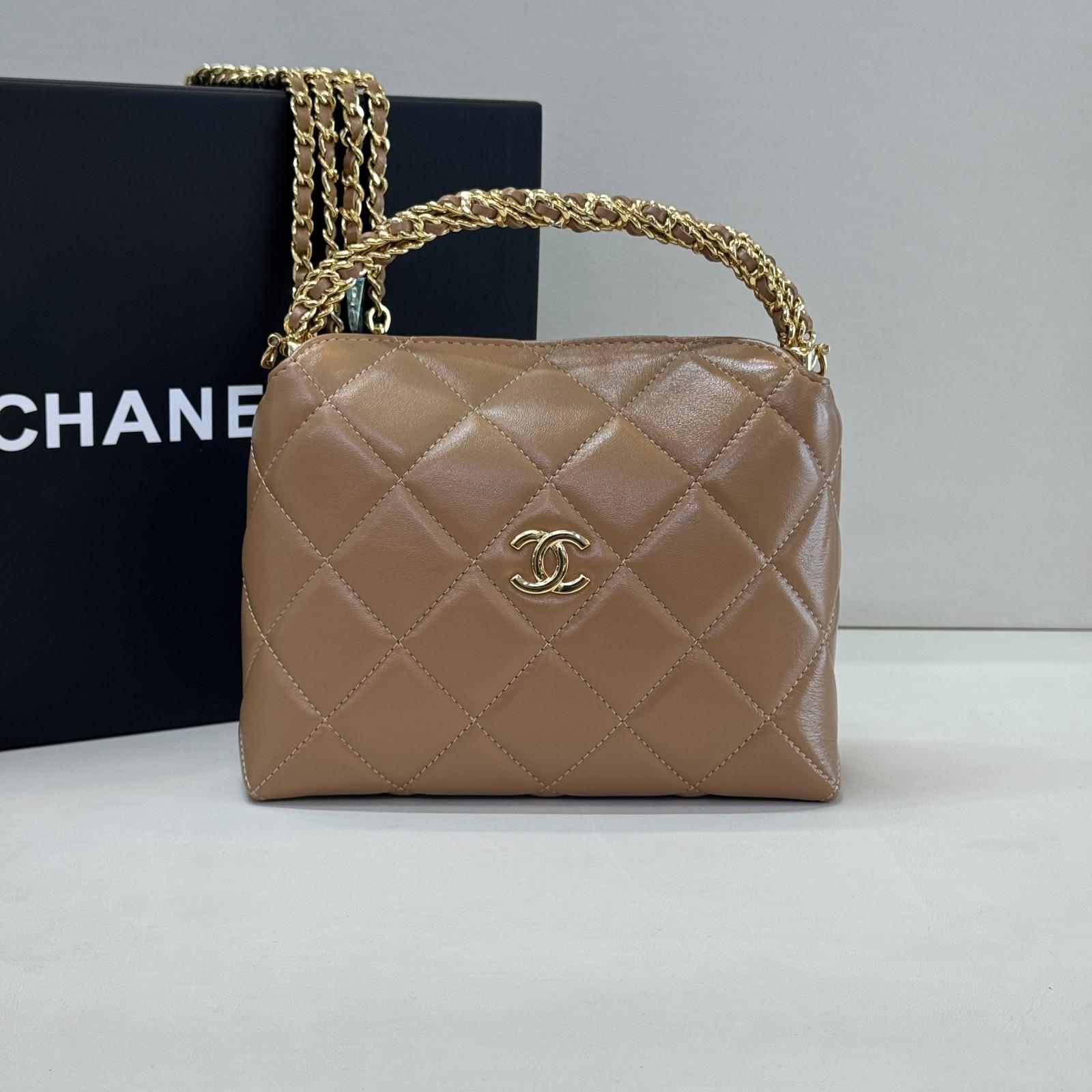 Chanel Vanity Case with Chain in diamond-quilted lambskin · 2