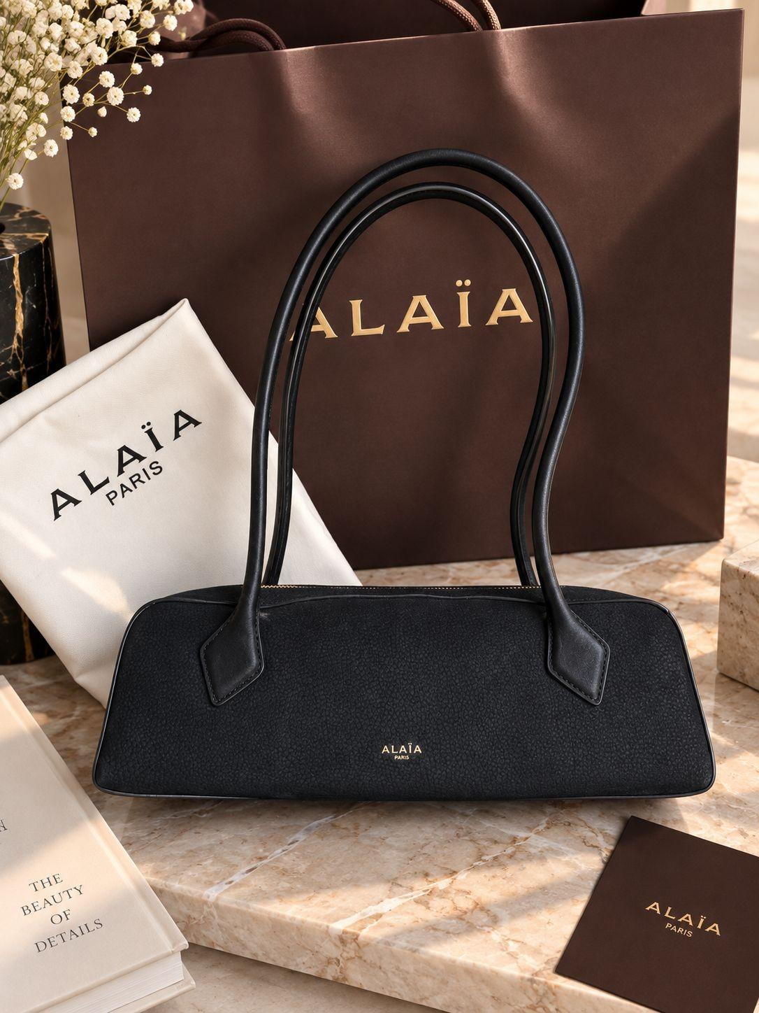 Alaïa Le Teckel bag with tubular handles · 2