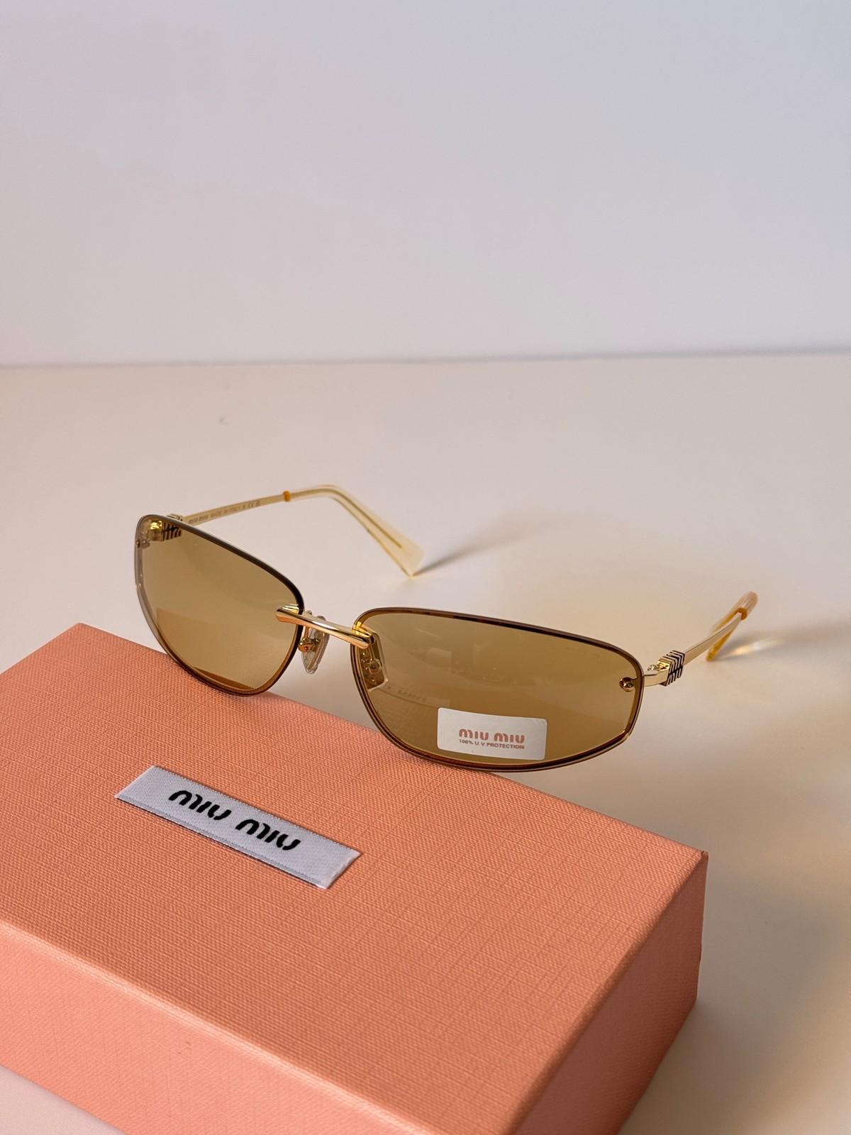 Miu Miu metal eyeglasses with twisted temple detail · 2