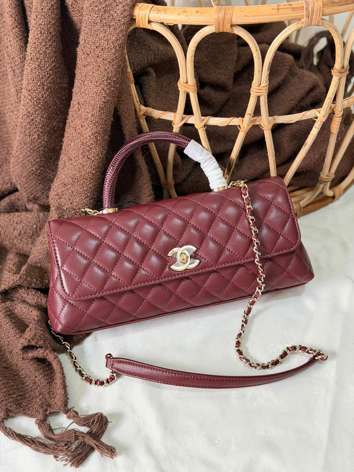 Chanel mini top-handle flap bag in quilted calfskin · 2