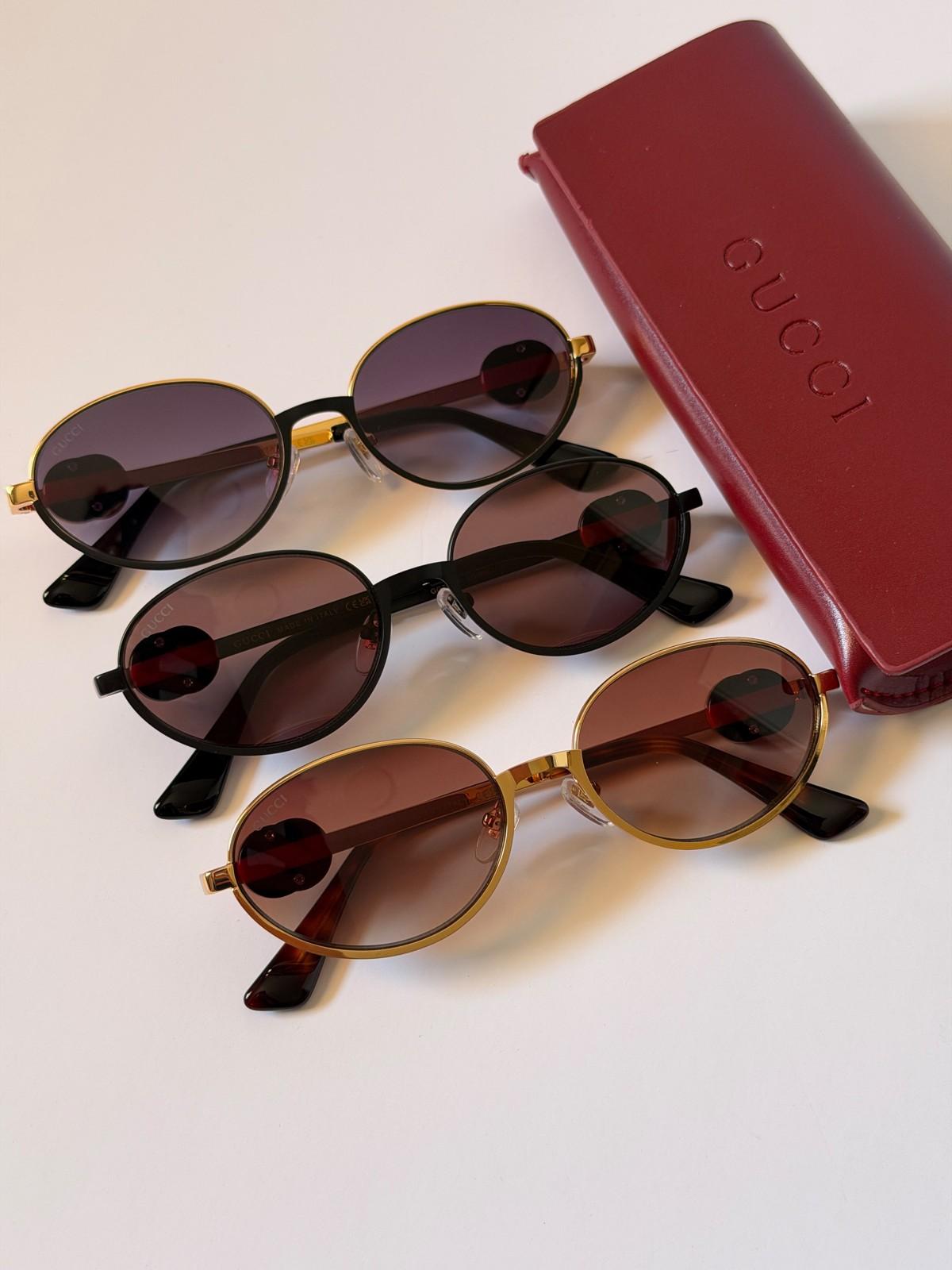 Gucci oval metal sunglasses with enamelled GG temple logo · 3