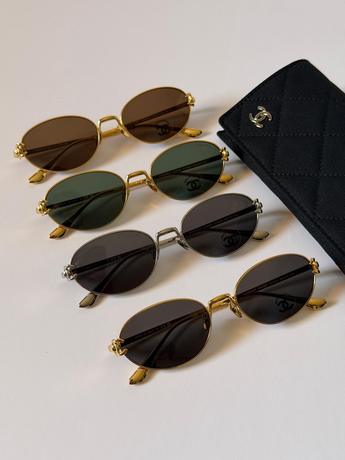 Chanel oval metal sunglasses with CHANEL temple engraving · 2