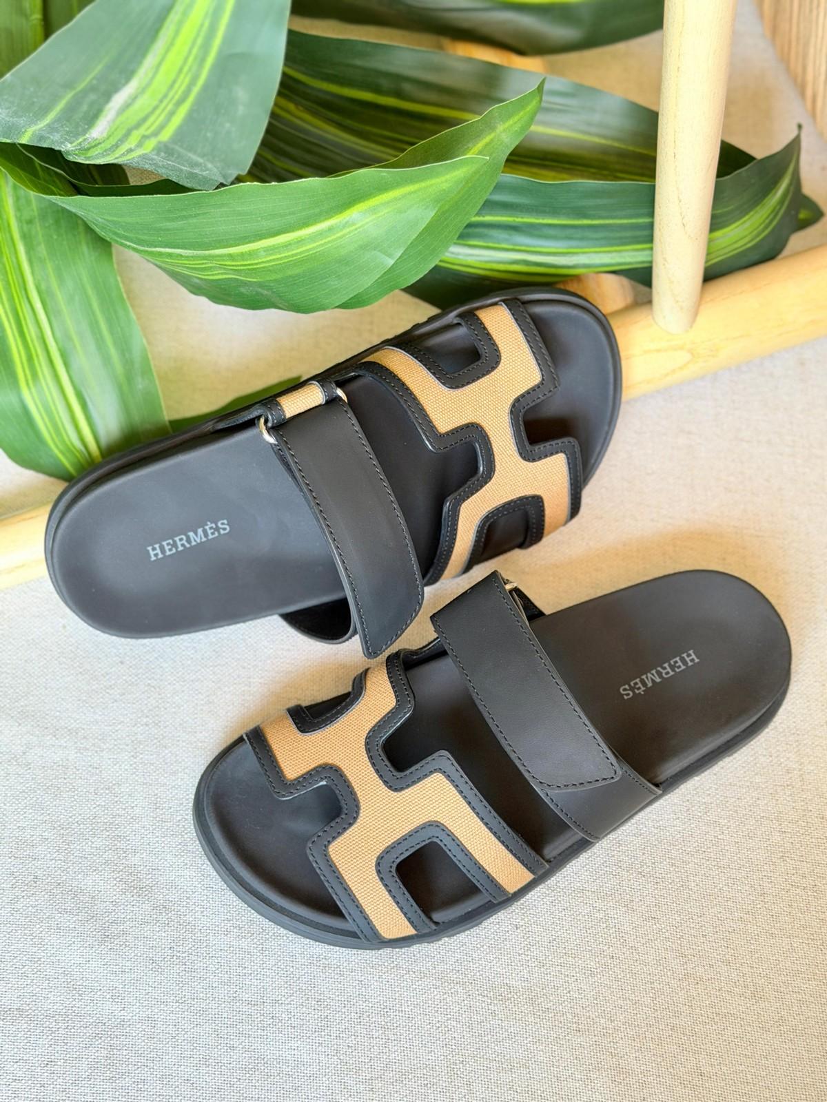 Hermès Ancha Slide Sandal in Black Leather with Beige Canvas H Strap · 2