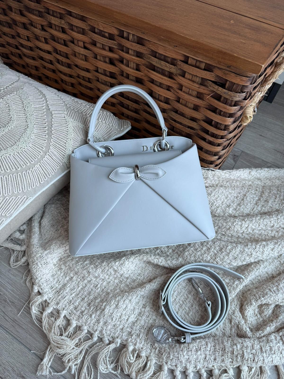 Dior top-handle bag with bow in smooth calfskin · 2