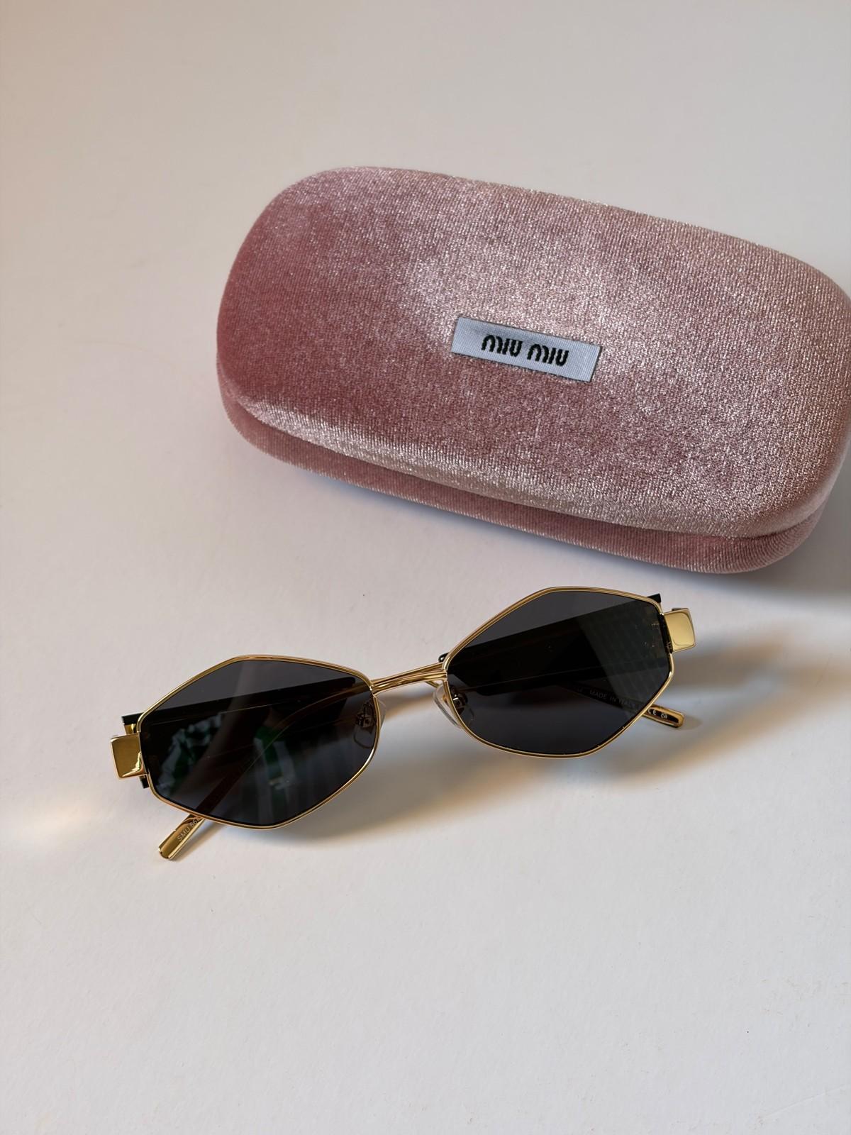 Miu Miu gold metal geometric sunglasses with miu miu temple tips · 2
