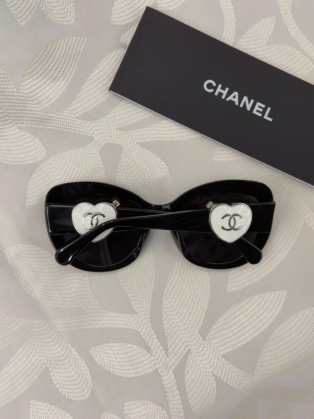Chanel black sunglasses with heart-shaped CC temples