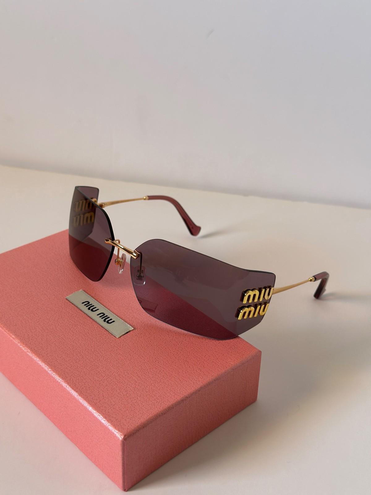 Miu Miu rimless sunglasses with miu miu logo temples · 3