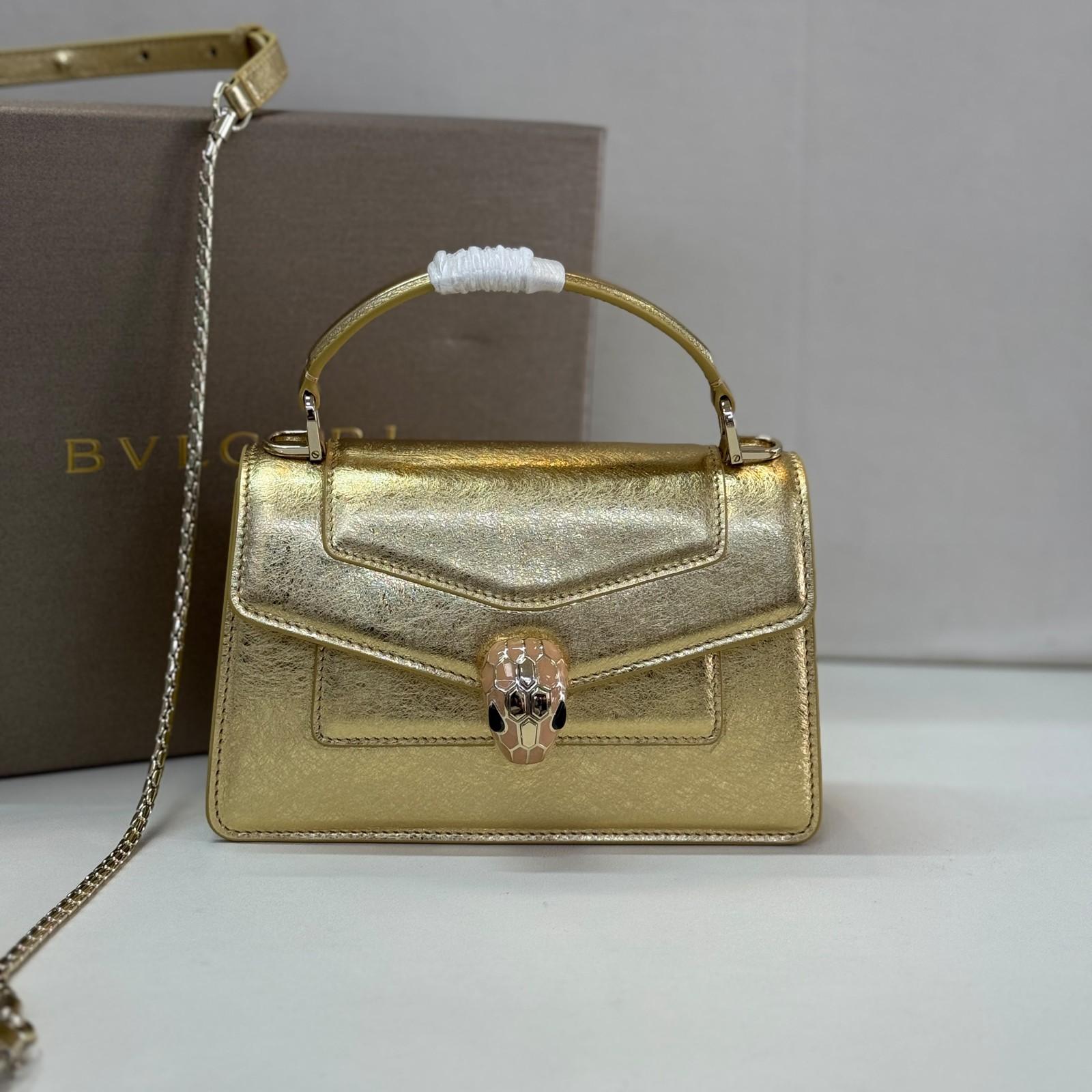Bvlgari Serpenti Forever top-handle bag with snake-head clasp · 2