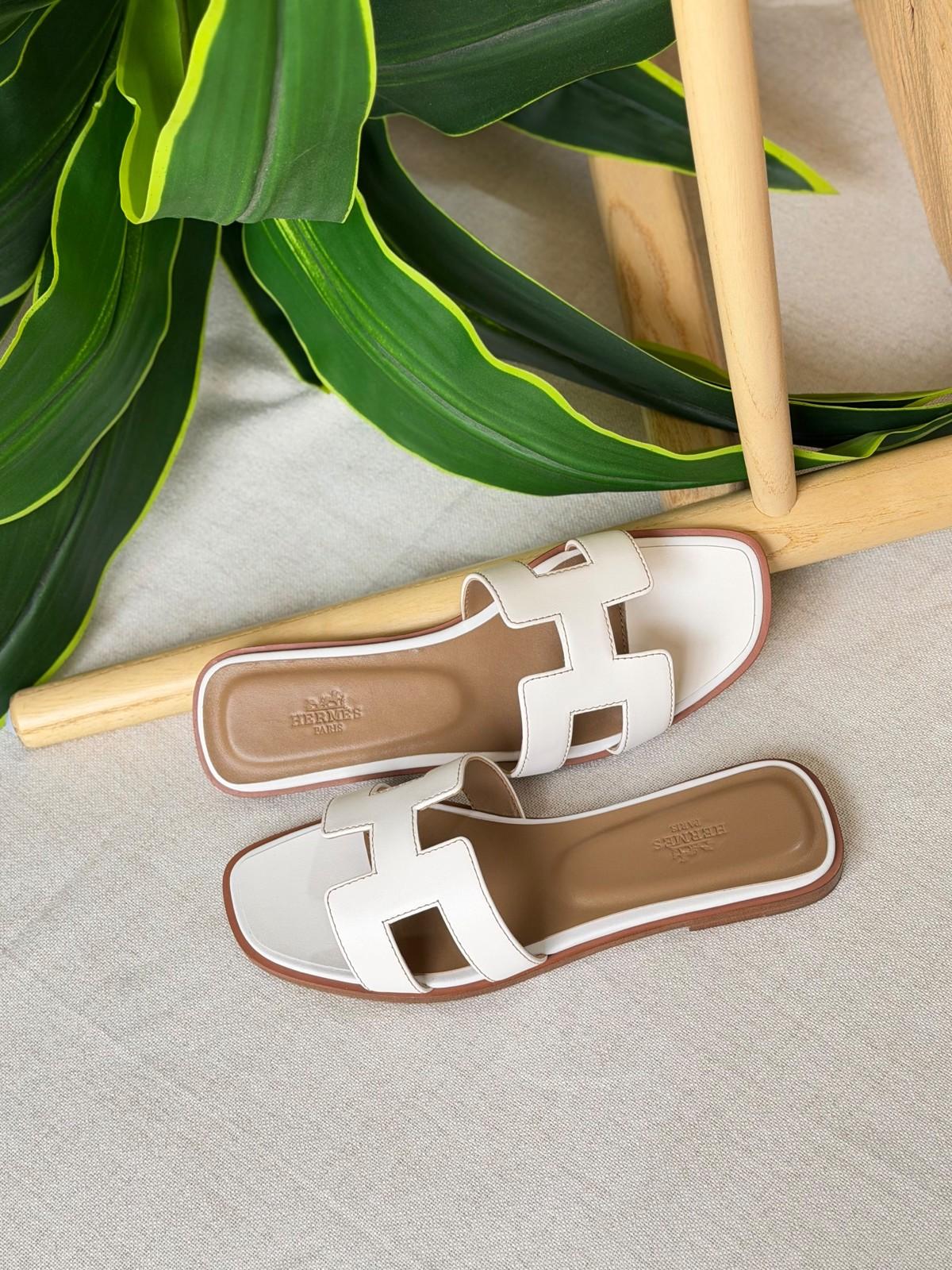 Hermès Oran Sandal in White Calfskin with Brown Leather Sole · 2