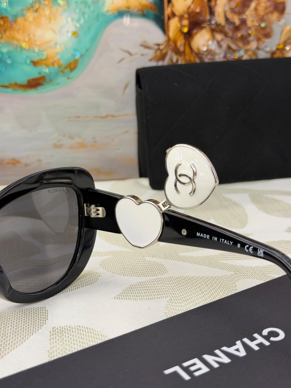 Chanel black sunglasses with heart-shaped CC temples · 3