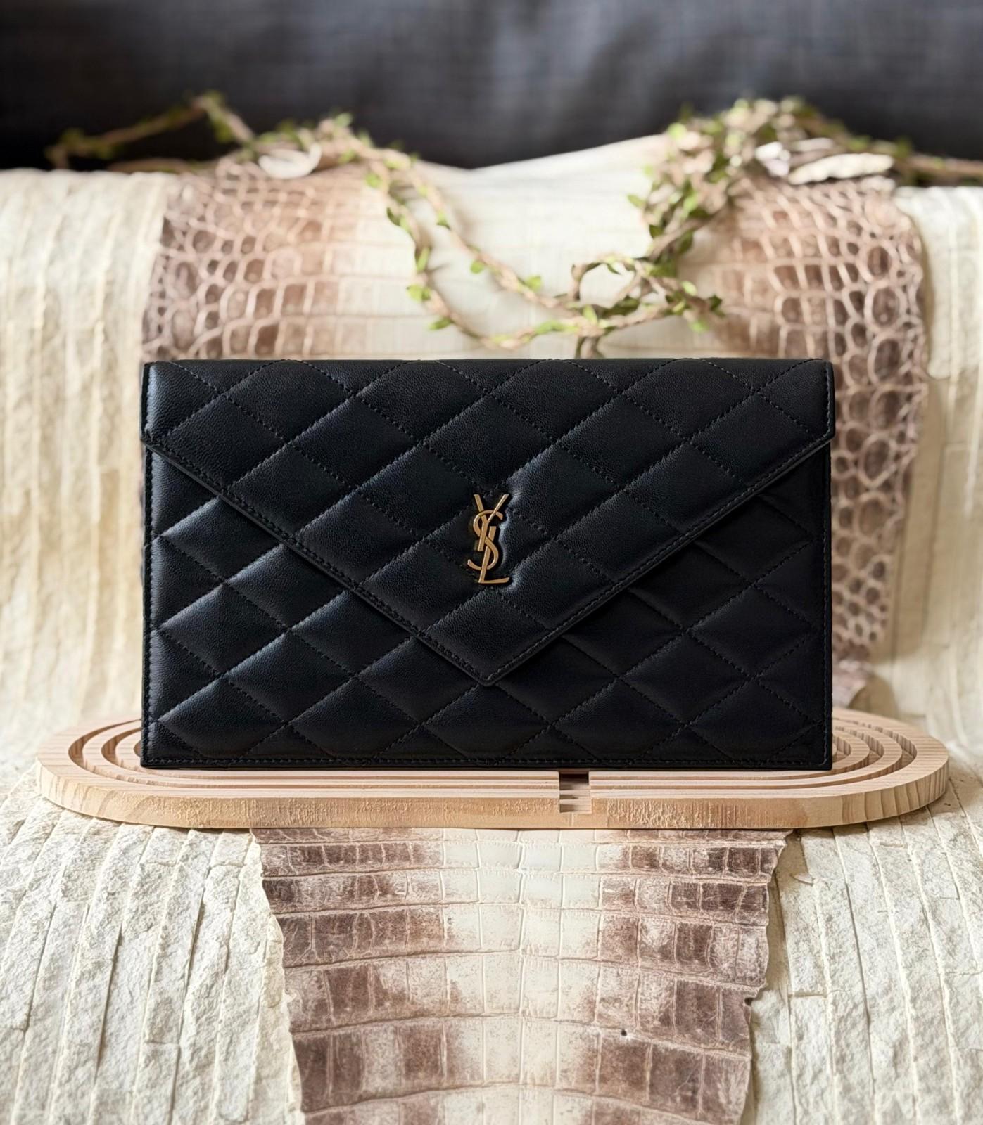 Saint Laurent Cassandre Matelasse envelope clutch in quilted leather · 2