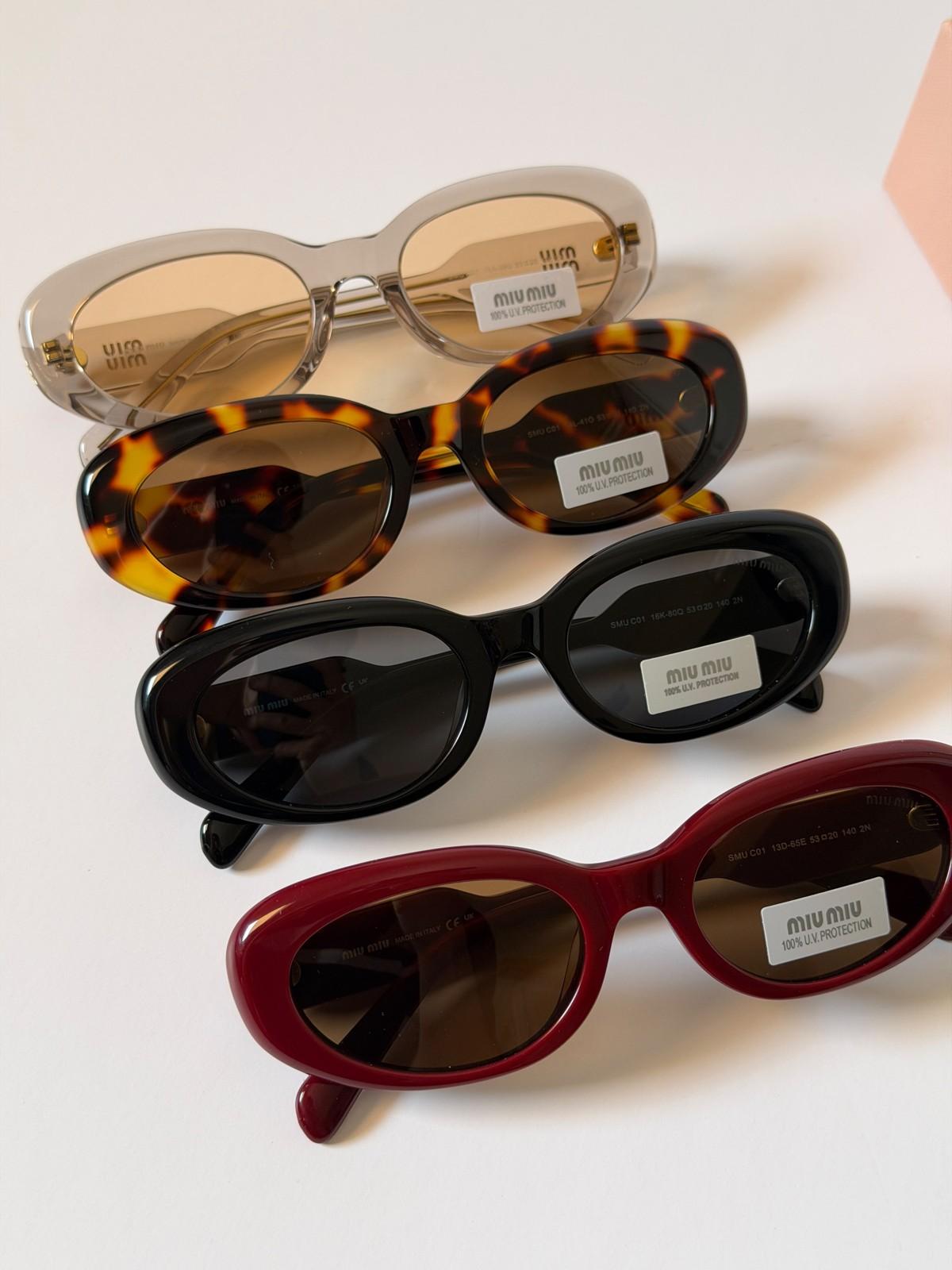 Miu Miu oval acetate sunglasses with logo plaque · 2