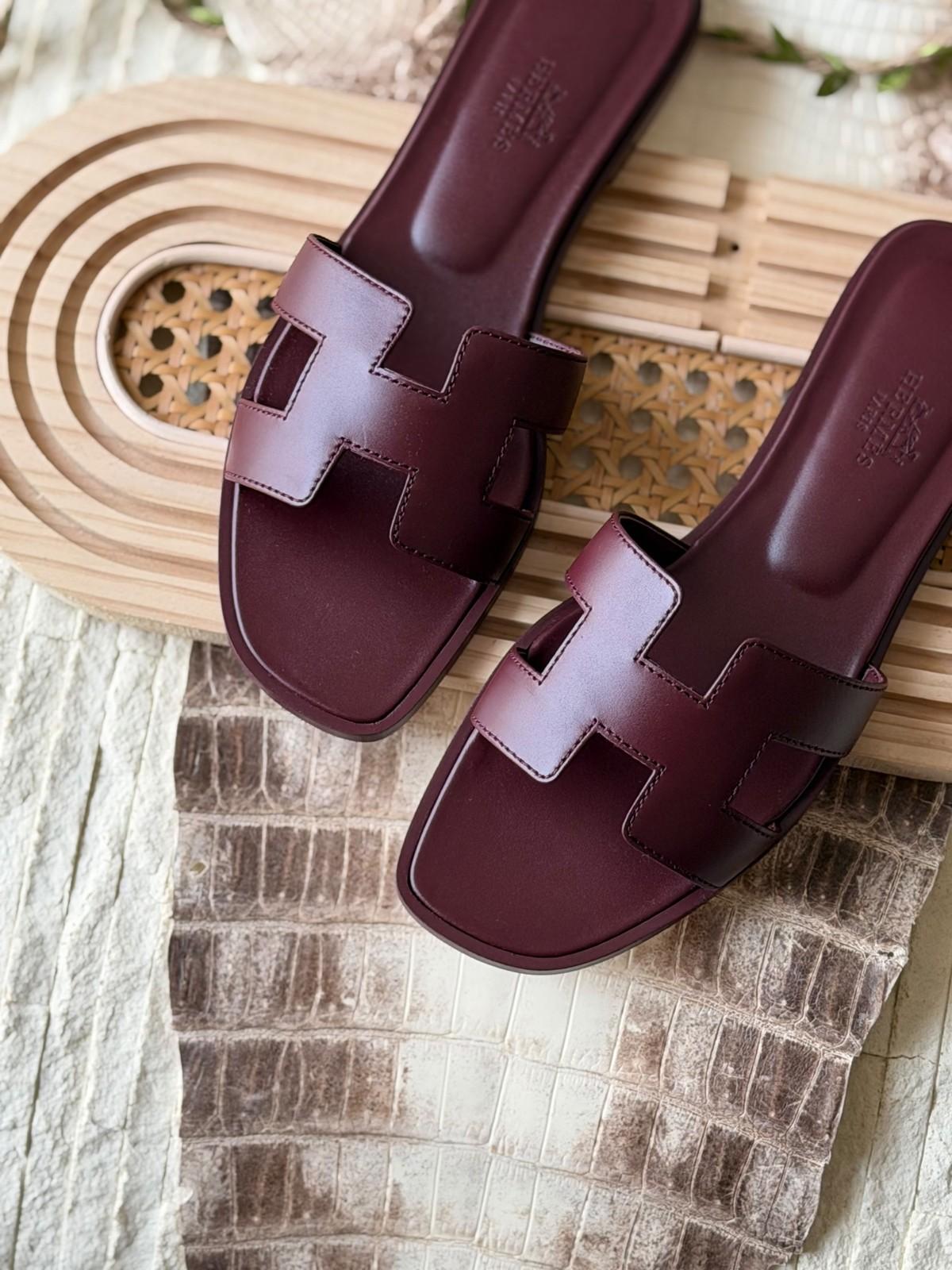 Hermès Oran sandals in burgundy box calfskin · 2