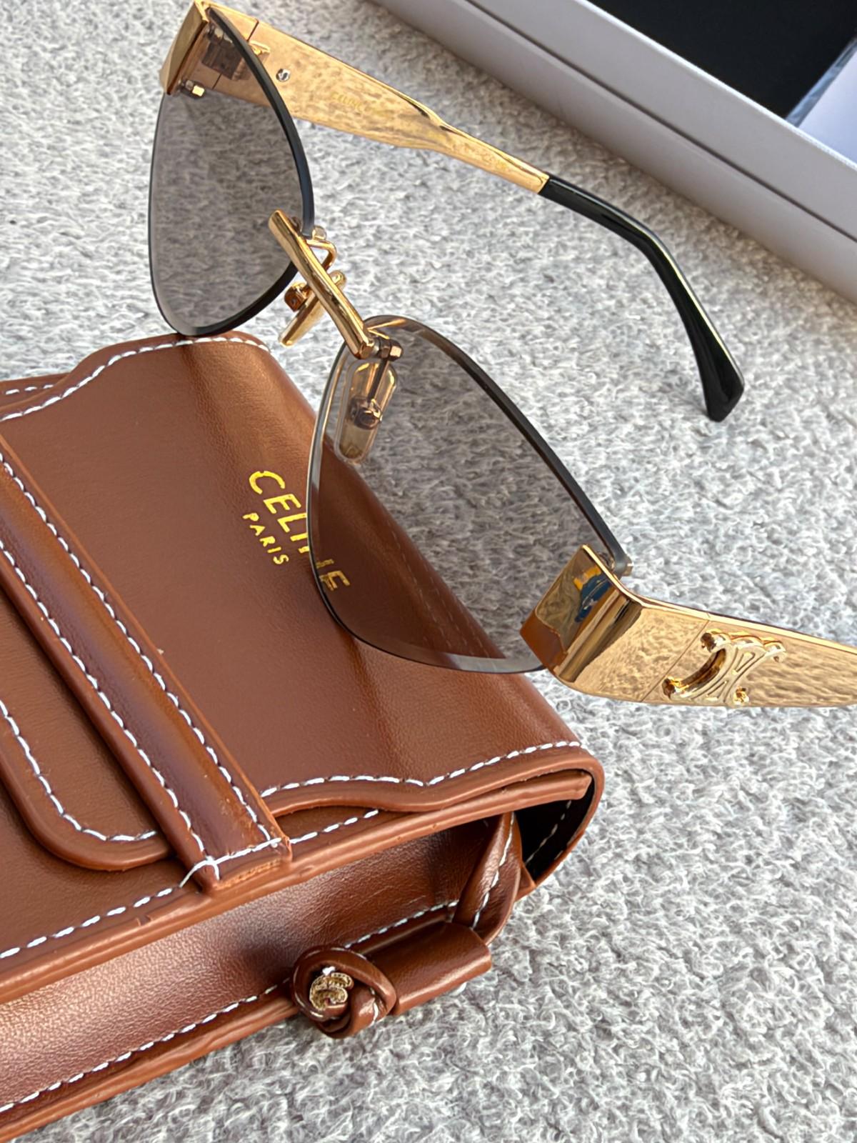 Celine Triomphe Metal oval sunglasses in gold with green lenses · 2