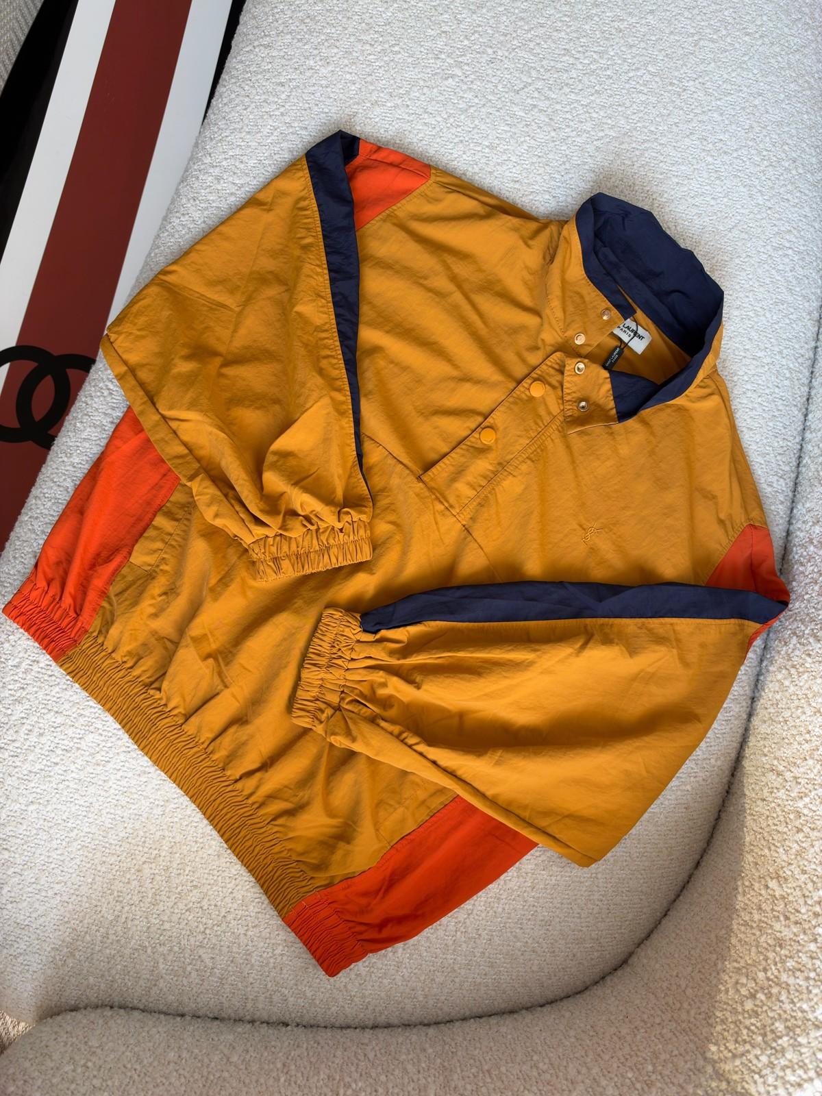 Colour-Block Nylon Pullover Jacket in Mustard Yellow with Orange and Navy Panels · 2