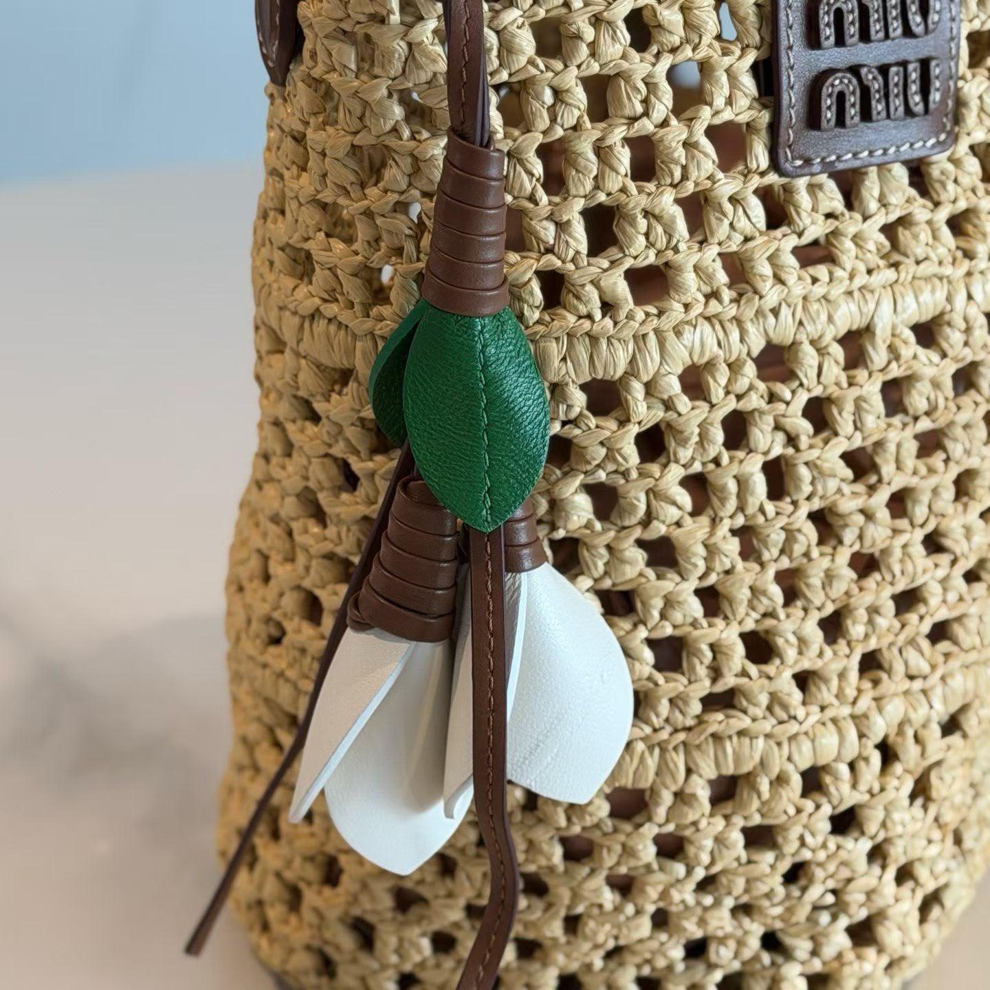 Miu Miu Crochet Raffia Bucket Bag with Leather Flower Charm · 2